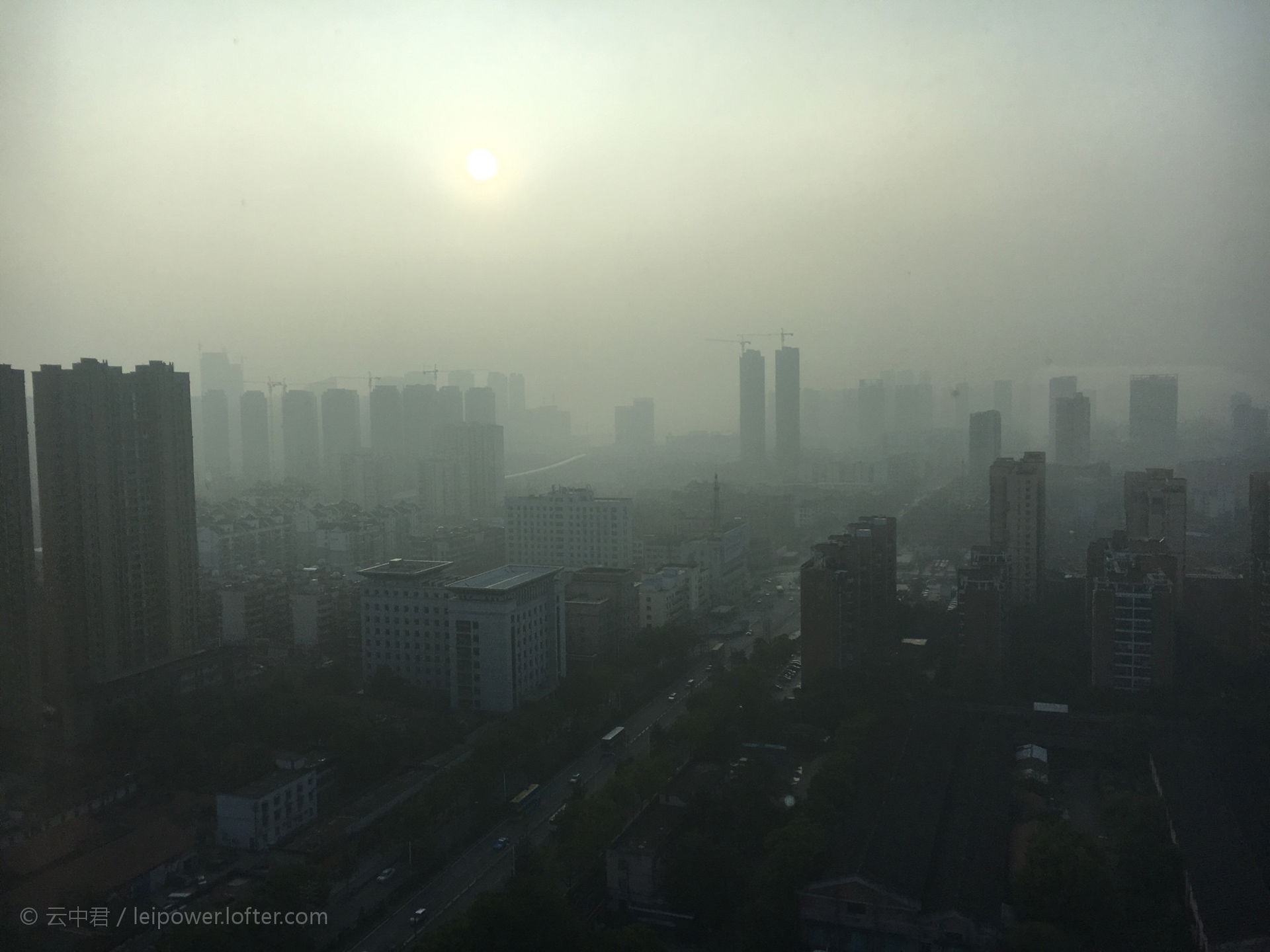 The smog shrouded Wuhan, capital of central China's Hubei provi…
