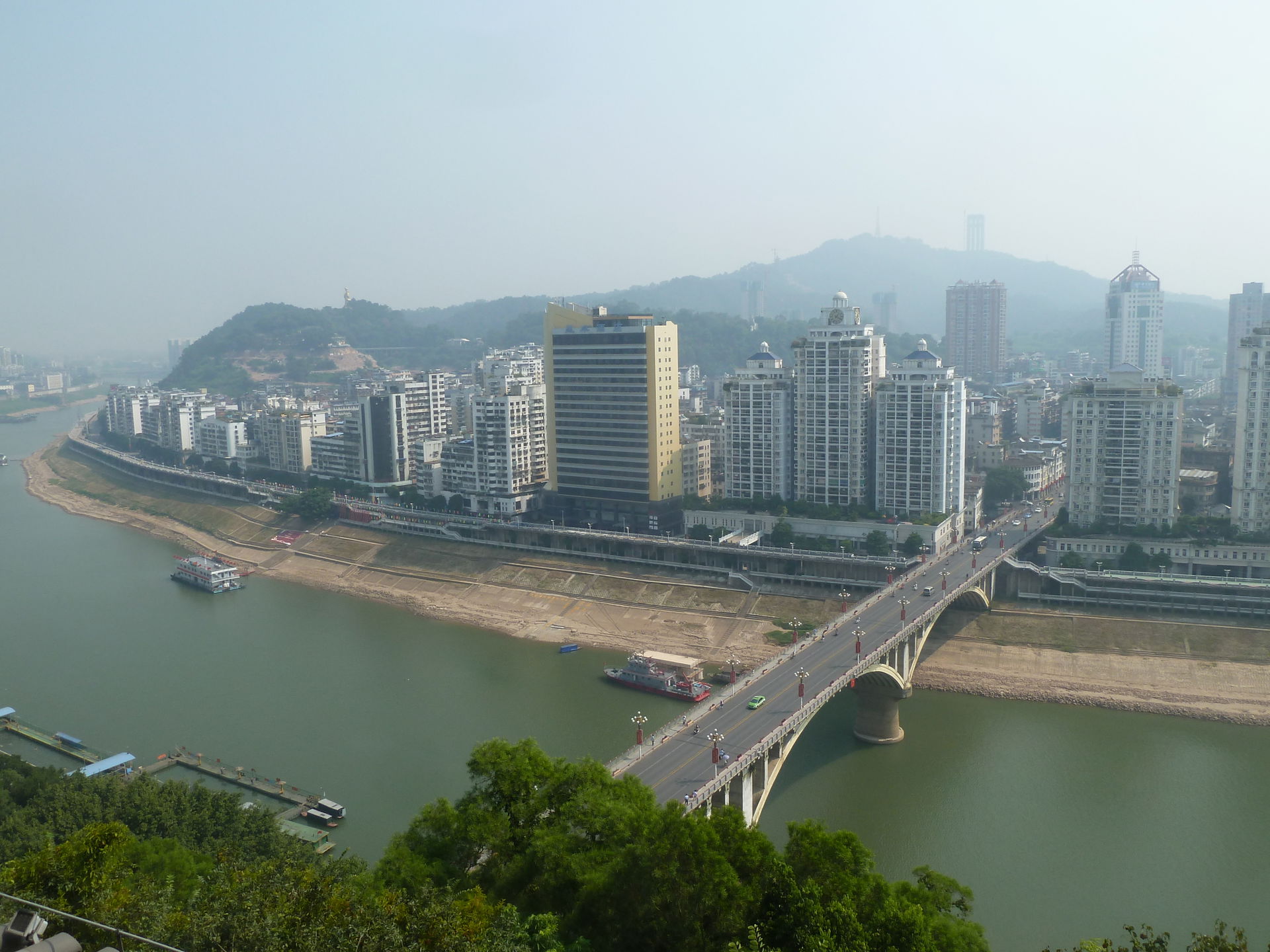 Photo of Wuzhou skyline taken from the top of the Hegang Tower …