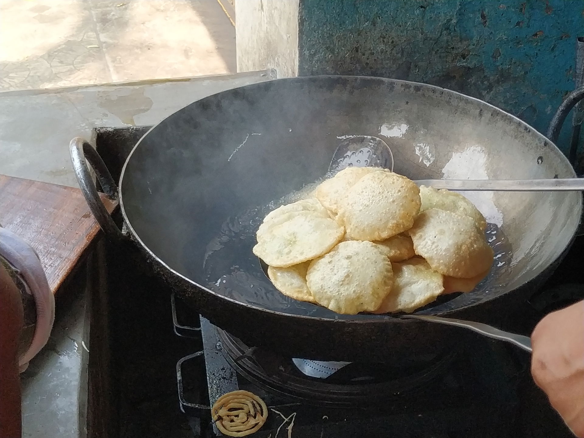 Deep frying Puri in Kolkata, India. Puri (sometimes spelled as …