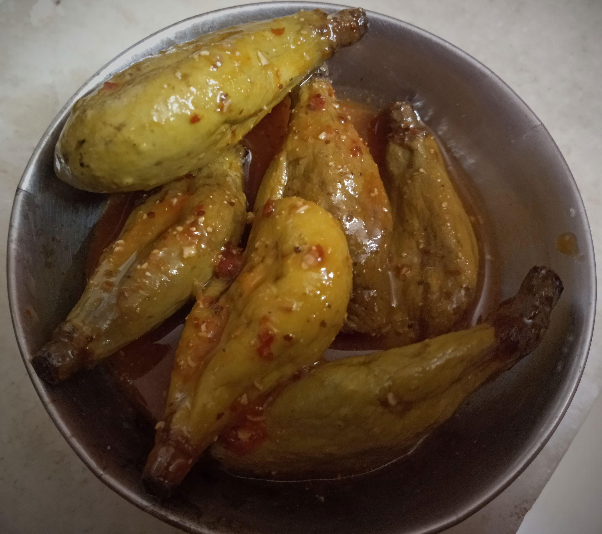 Vadu Mangai Pickle is tender baby mangoes pickled in a roasted …