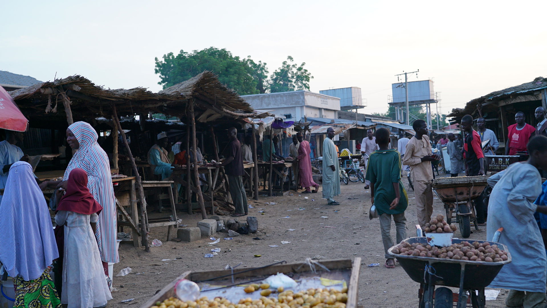 Foodstock and people at the market in Bama Borno State Nigeria.…