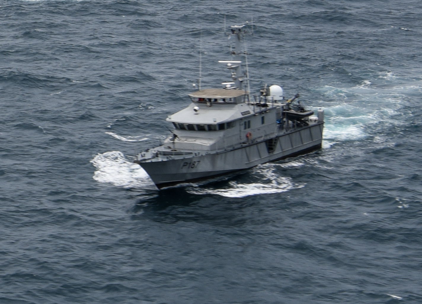 USCGC Mohawk (WMEC 913) sails alongside a Nigerian Navy ship in…