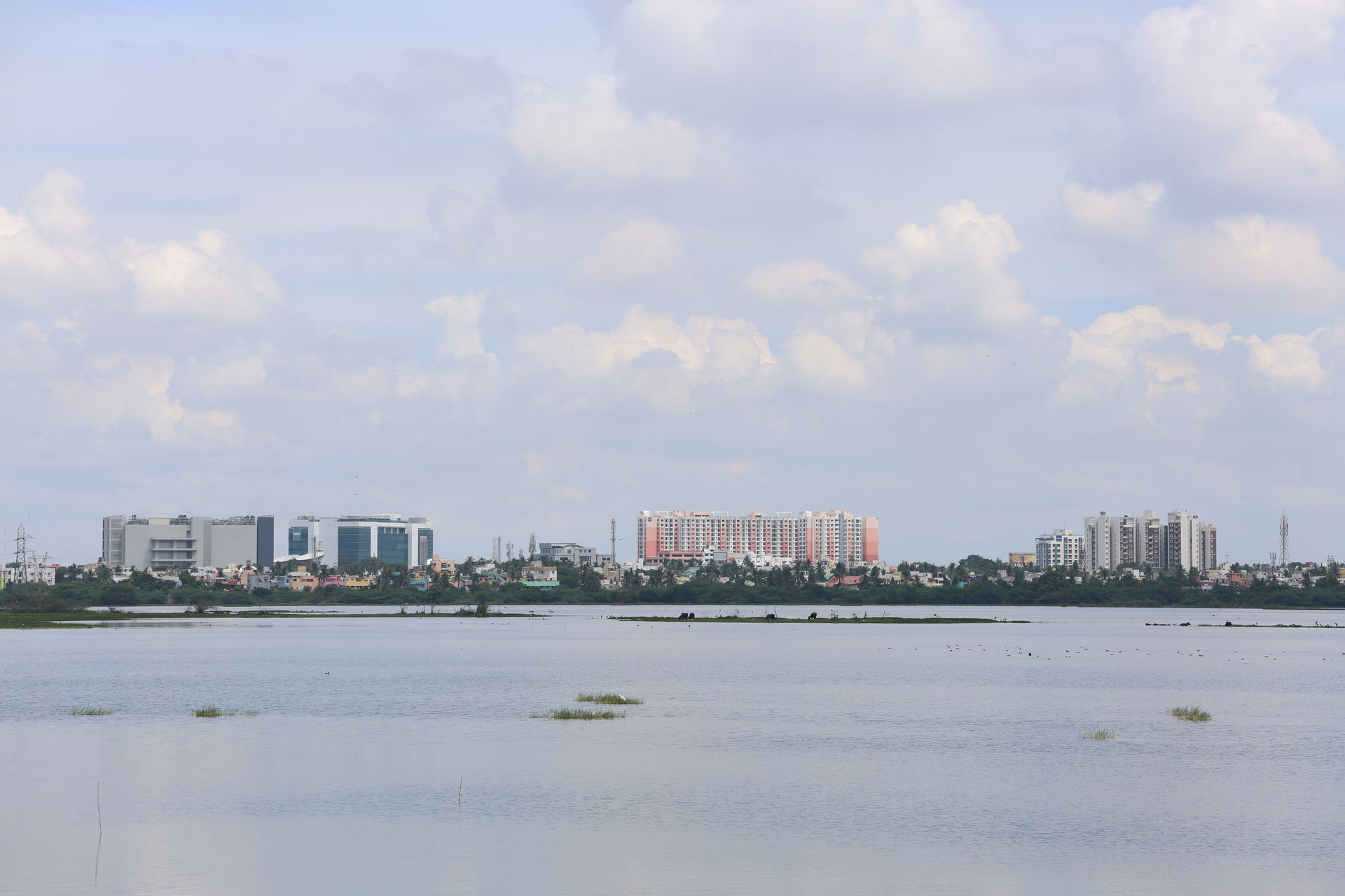 Chennai view with a lake in front.