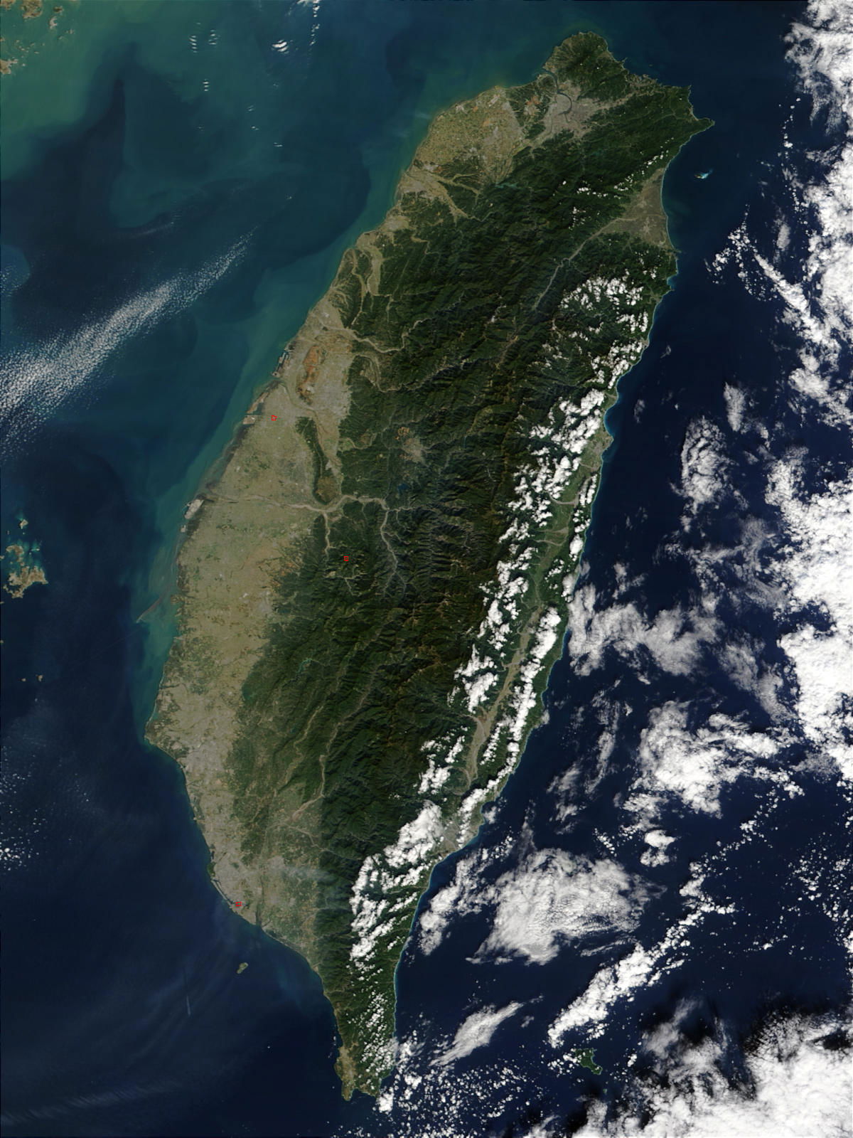 Satellite photo of Taiwan. Description by NASA:  "The island of…