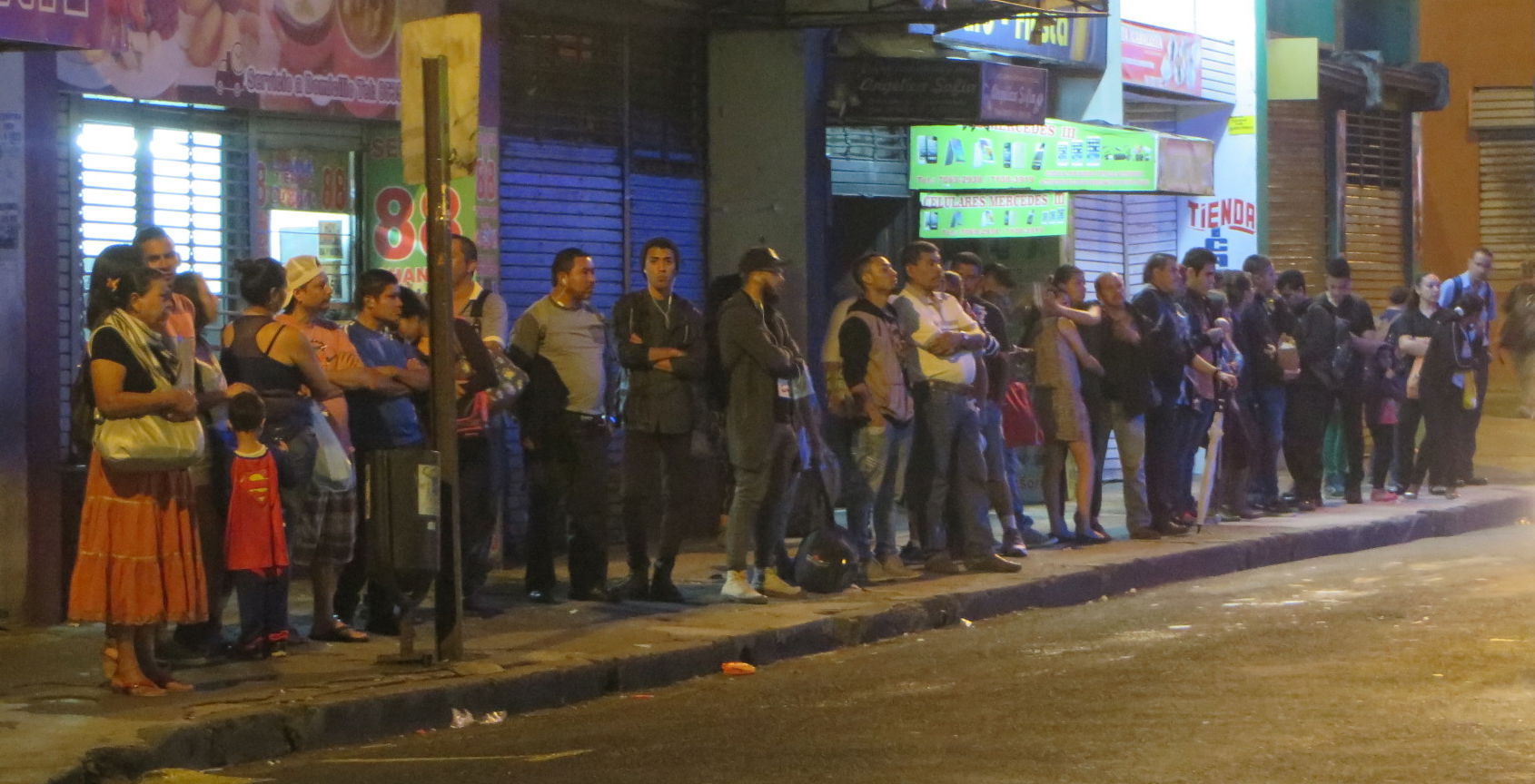 A Sunday evening bus queue in San José, Costa Rica.