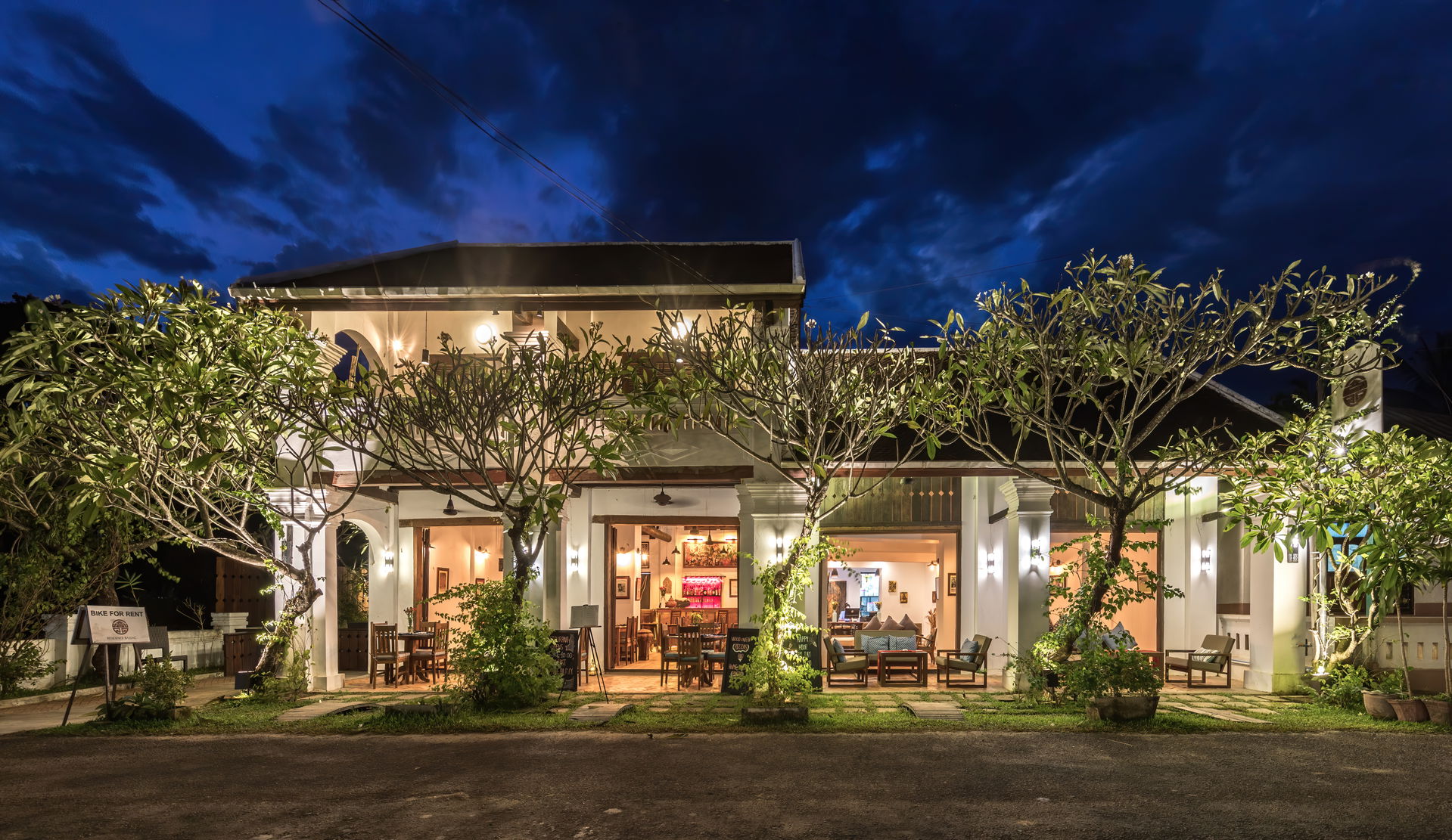 Exterior facade of Residence Bassac at blue hour, town of Champ…