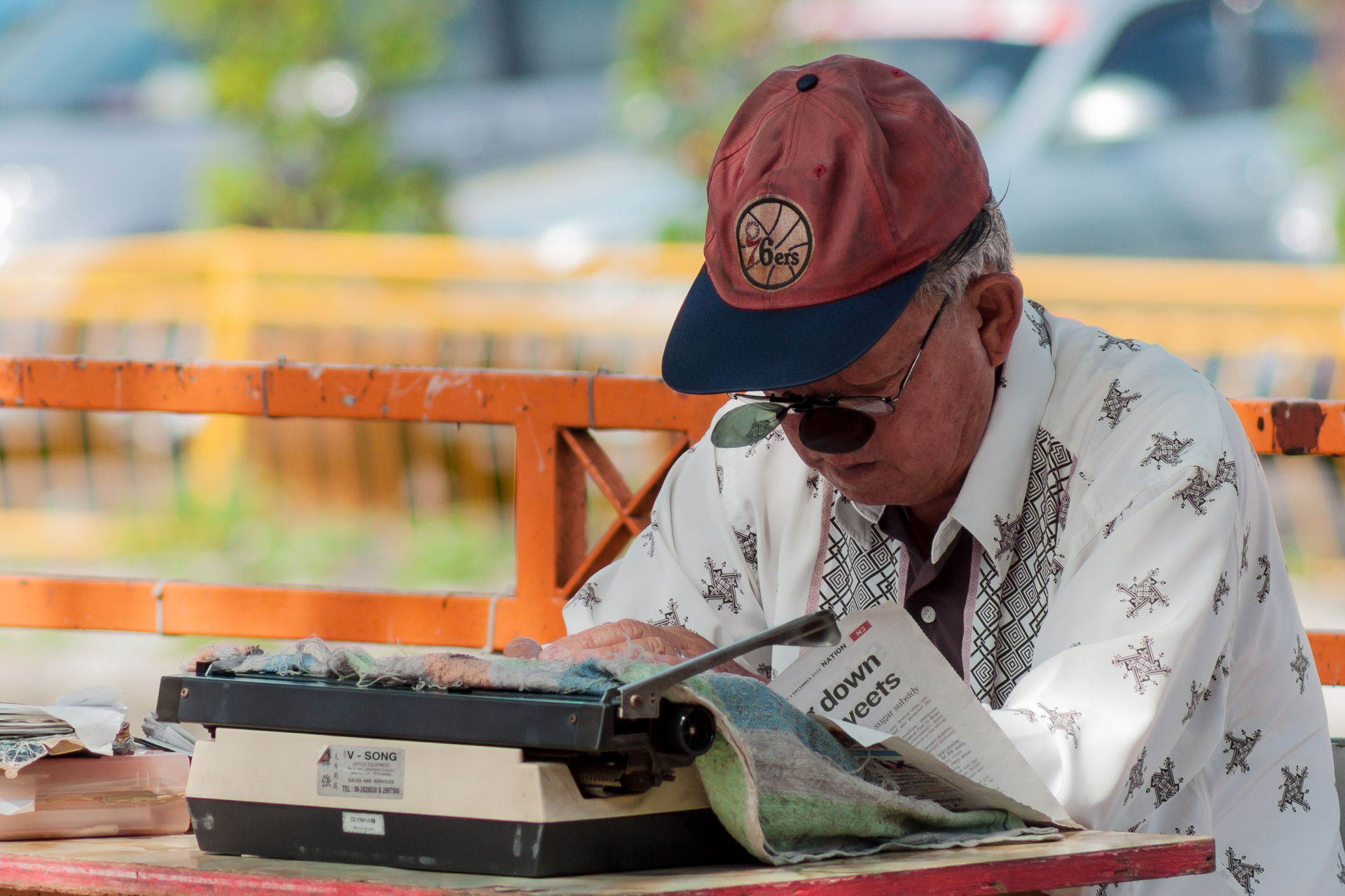 Melaka City, Malaysia: An owner of a typewriter offering docume…