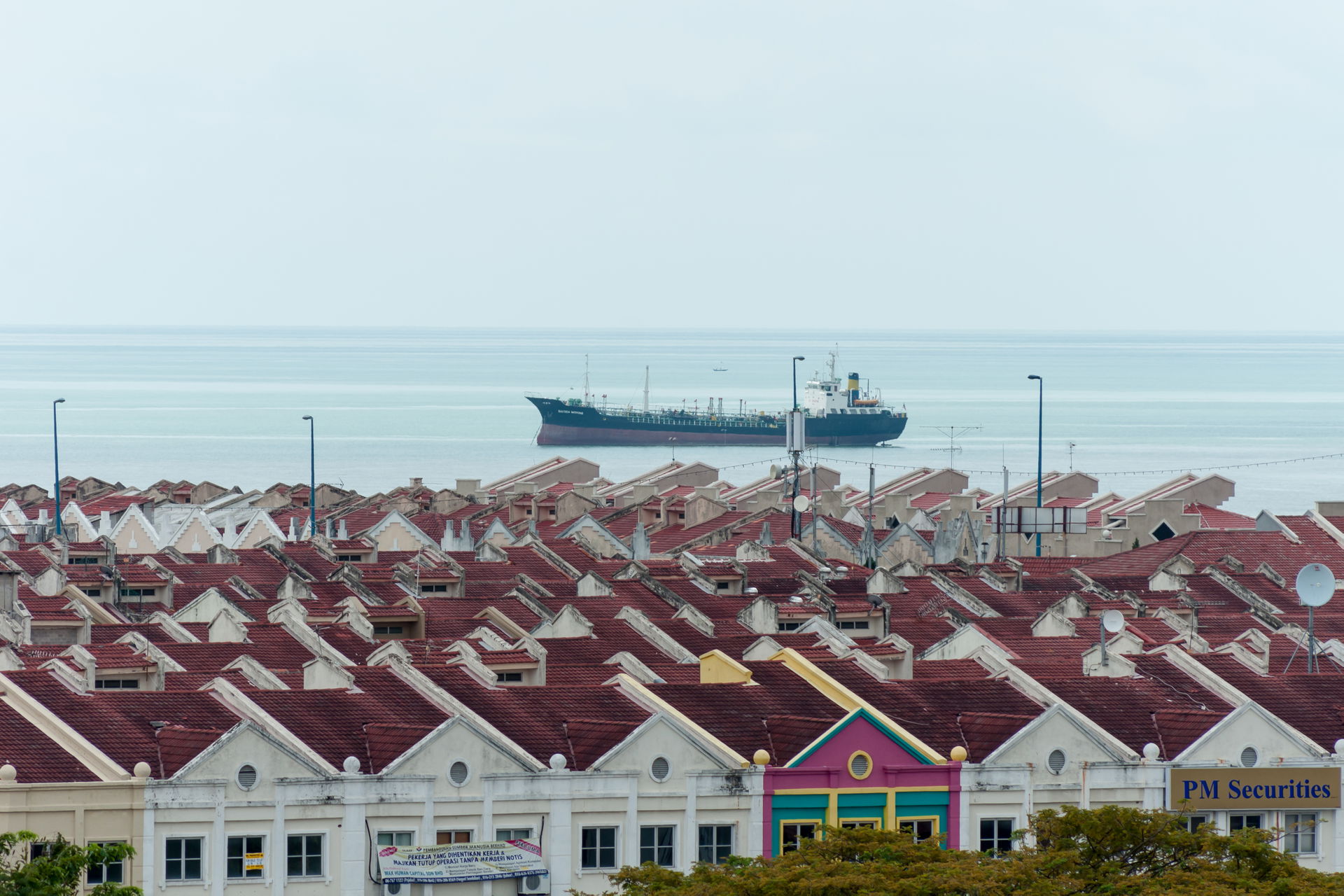Melaka City, Malaysia: A ship anchoring in the Melaka Straits o…