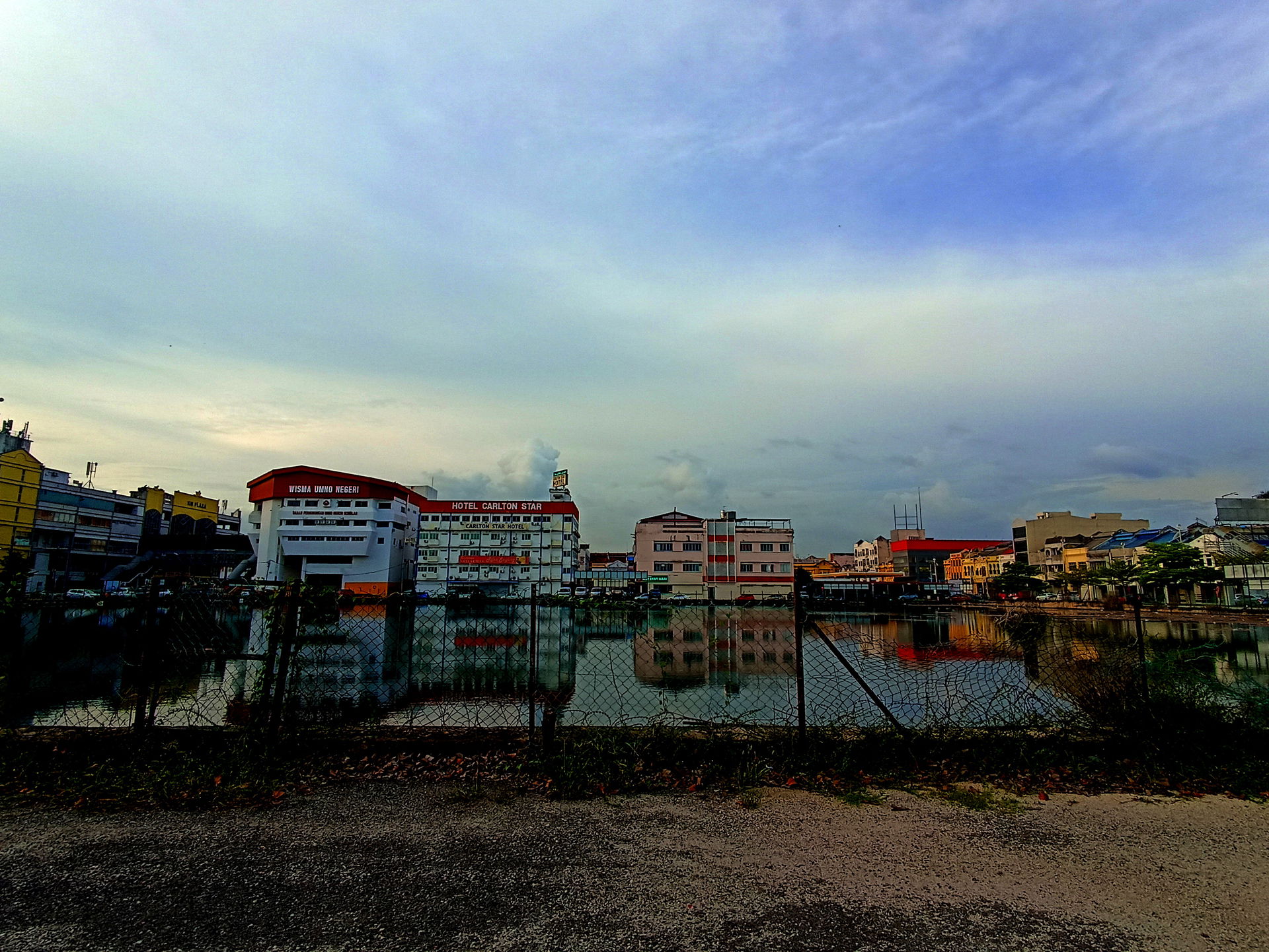 Opposite Seremban Square is a large pool which is supposed to b…