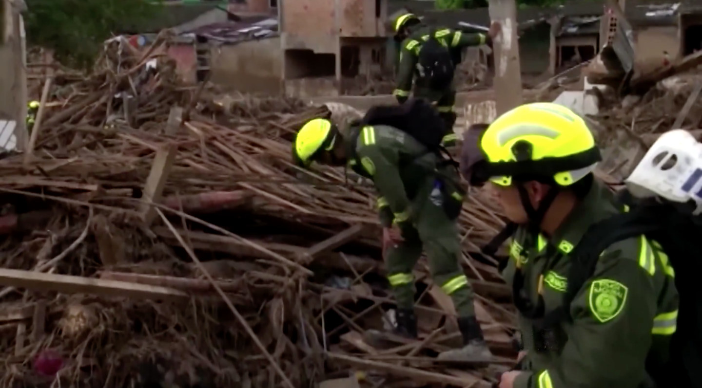 Rescuers searching for potential survivors in debris left behin…