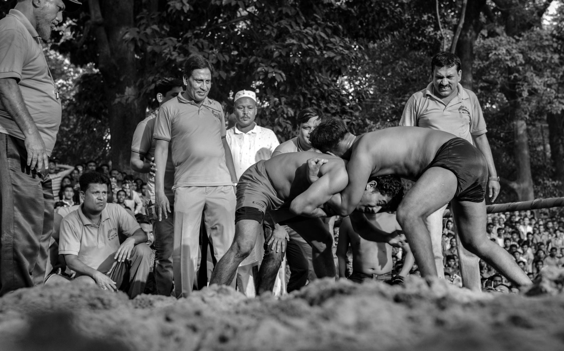 Two "Boli (Wrestler)" fighting in a wrestling match. "Boli Khel…
