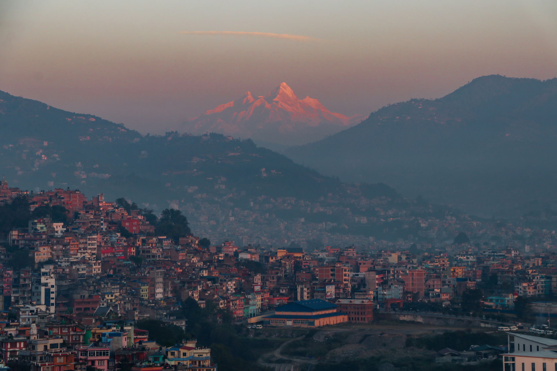 View of Kirtipur and hills and mountains at dawn from Jalpa Dev…