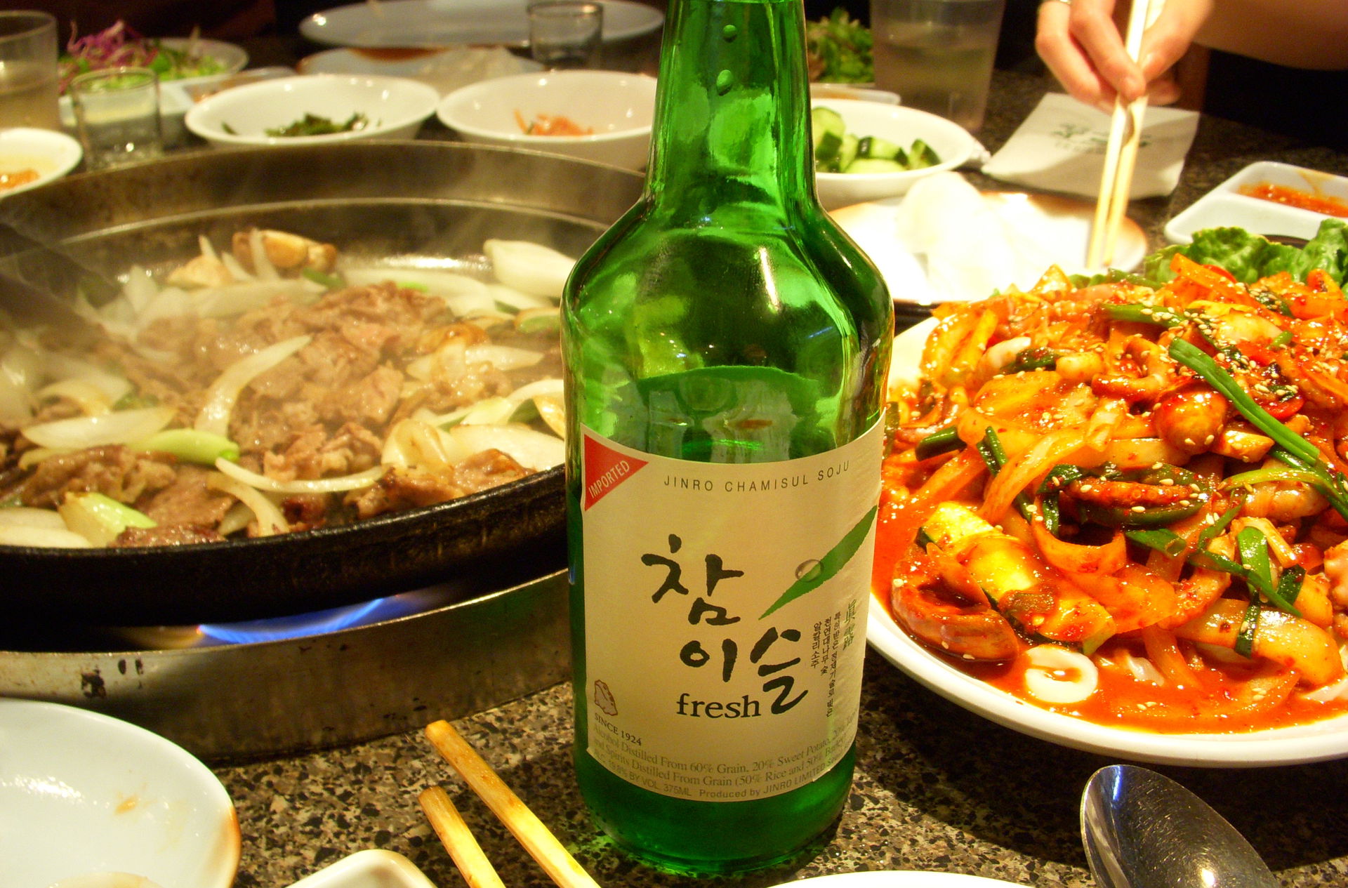 Bulgogi, soju (alcoholic drink) and Nakji bokkeum
