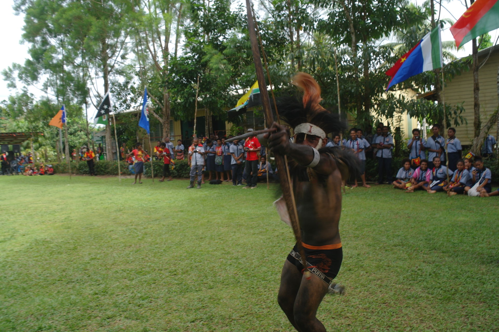 A student performing a warrior dance from the Faiwolmin Tribe o…