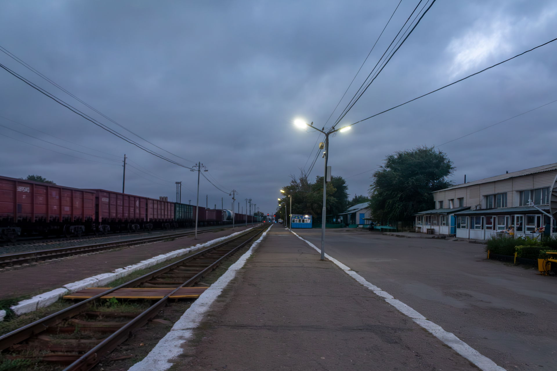 Ayagoz railway station platform photographed at the sunrise. Ay…