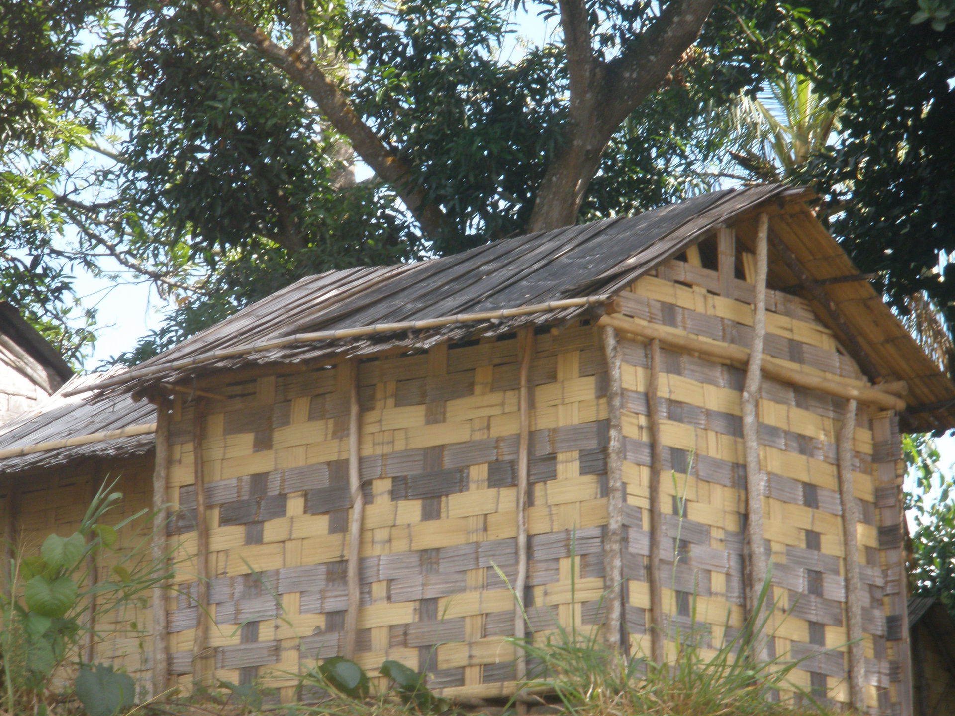 House made of woven pounded bamboo in Sambava, Madagascar