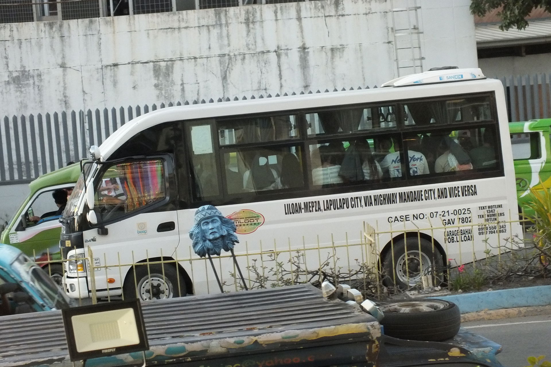 White modern jeepney is located in Lapu-Lapu City.