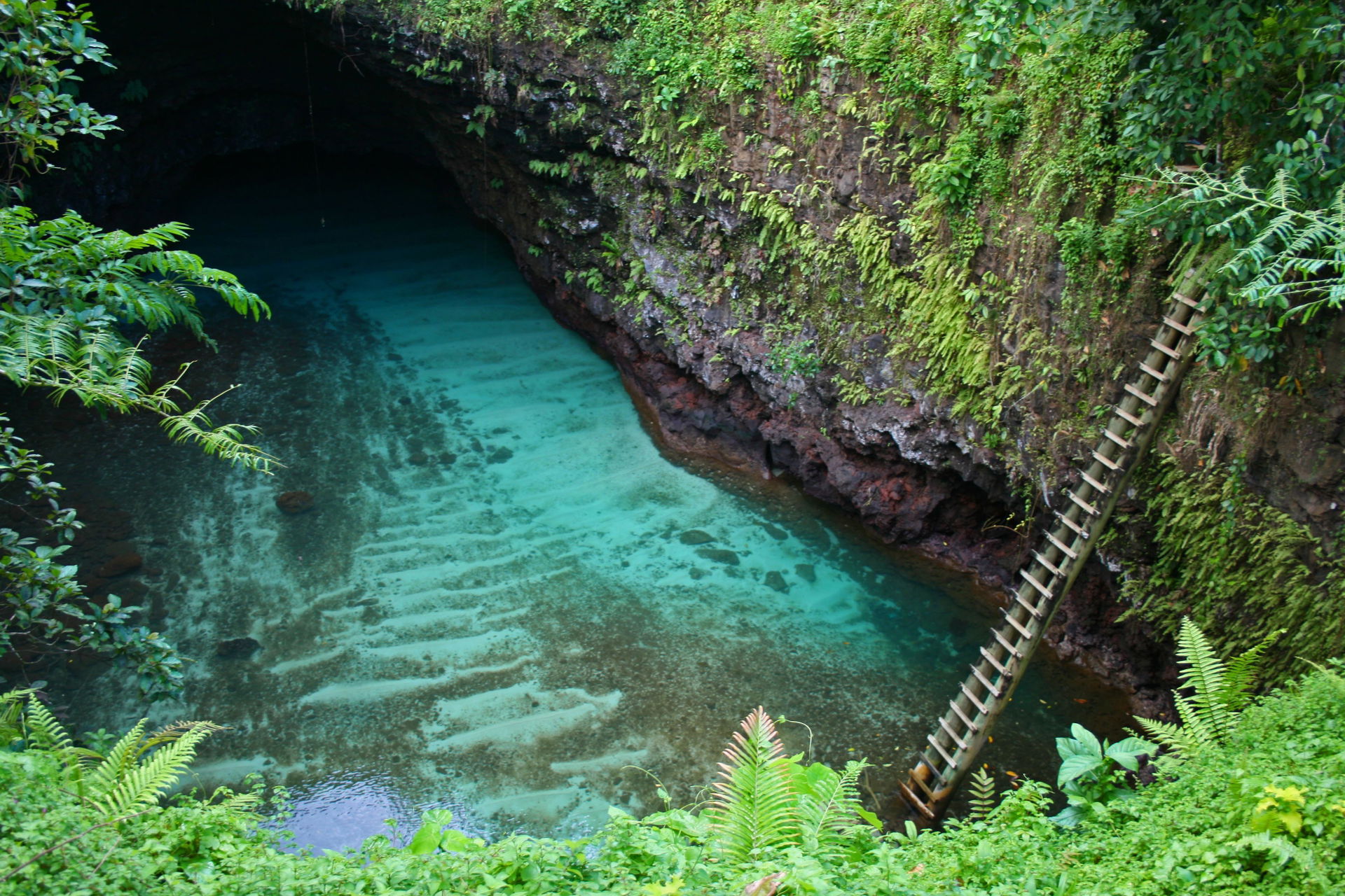 To Sua (ocean trench), one of two large holes in the ground by …