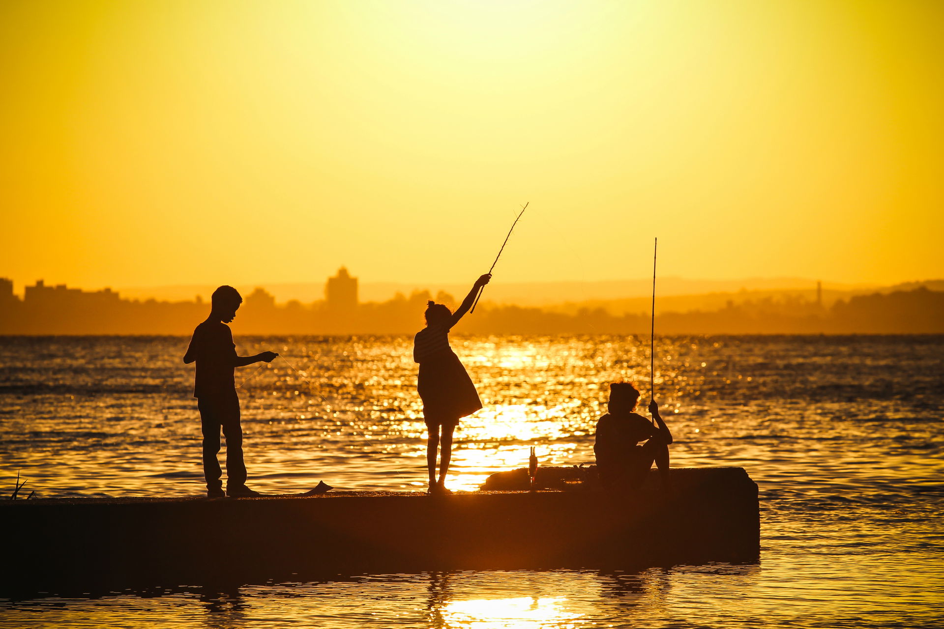 Children fishing in Guaíba Lake, Porto Alegre, Rio Grande do Su…