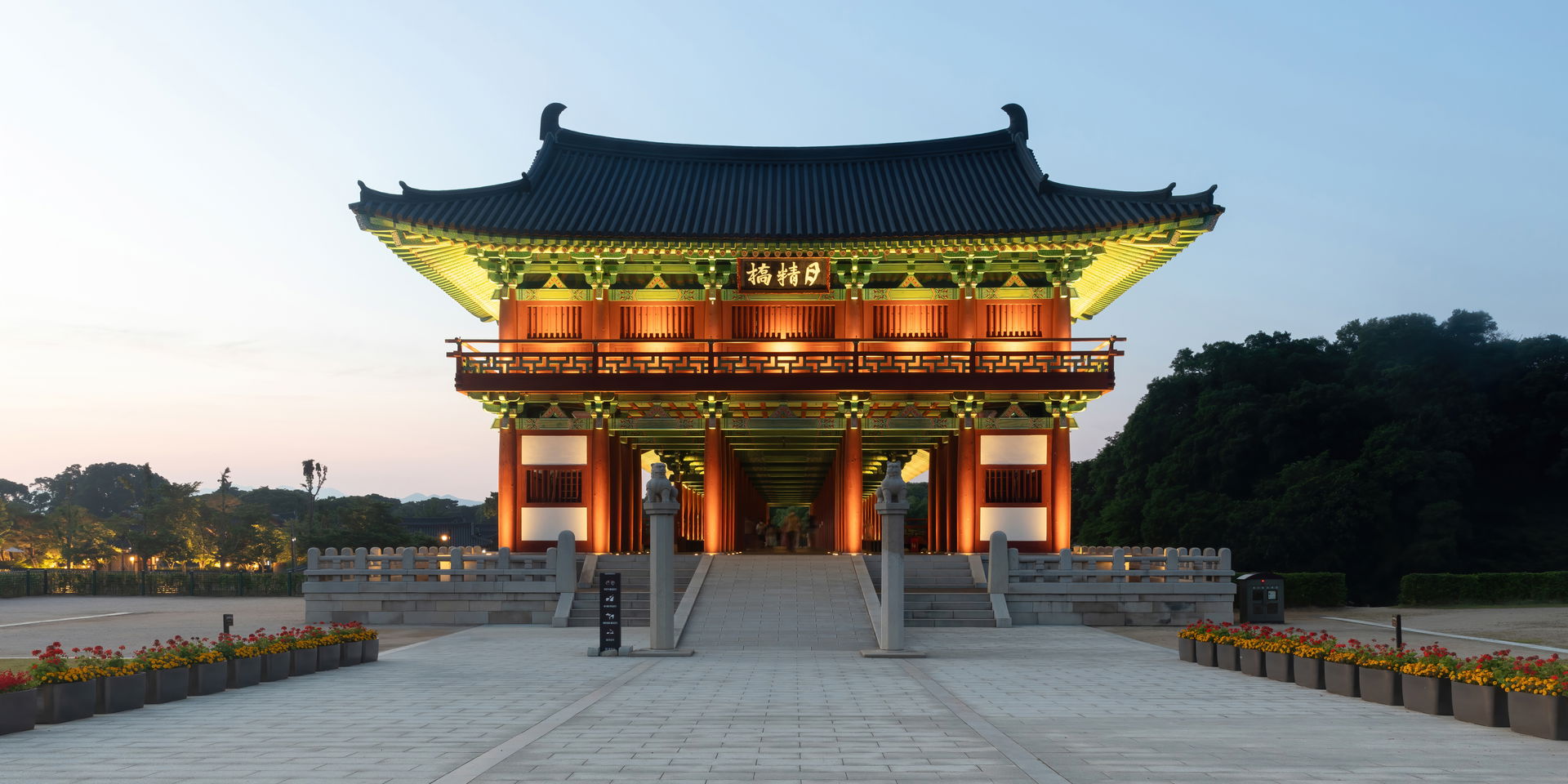 Southern side of Woljeonggyo Bridge illuminated at sunset, with…