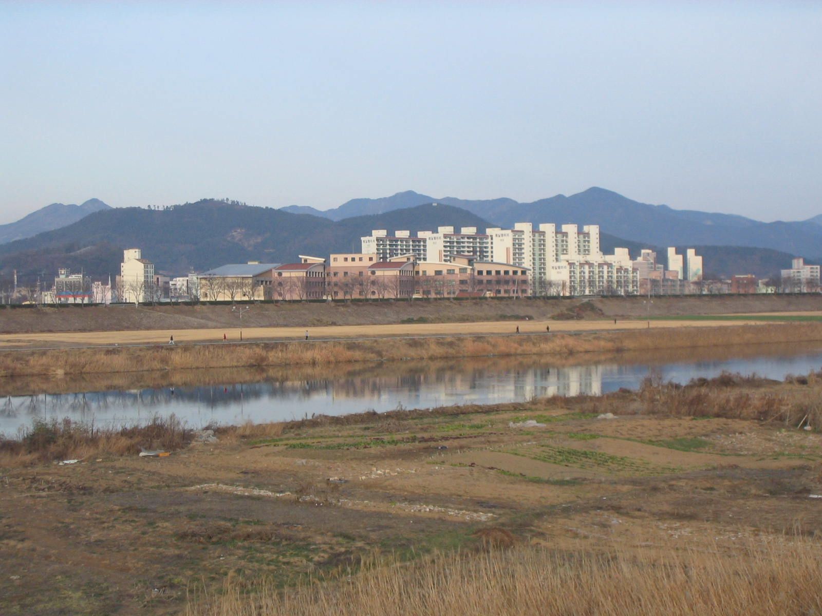 The city center of Miryang, seen across the Miryang River from …