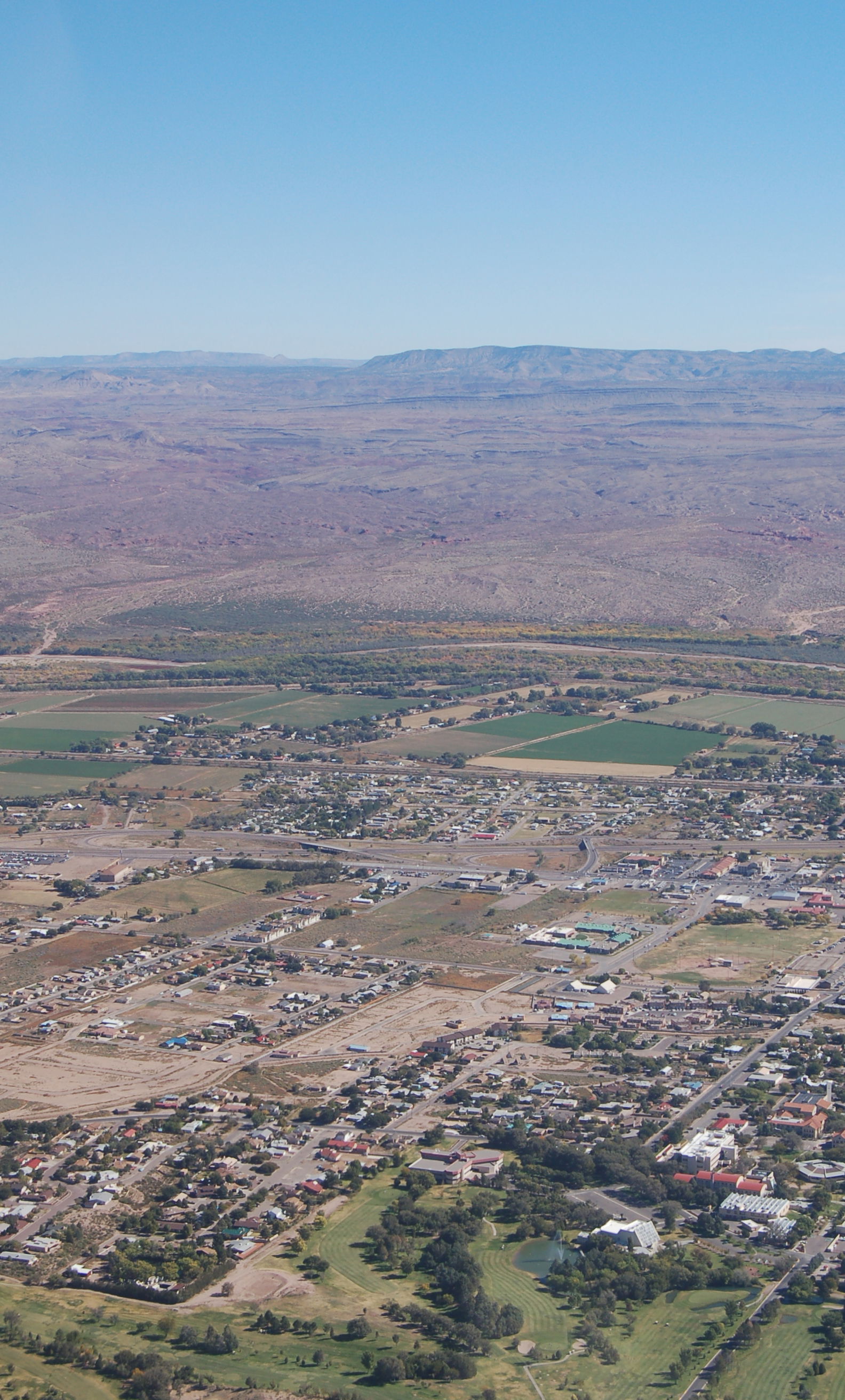 A view of part of Socorro, New Mexico. Aerial photograph, taken…