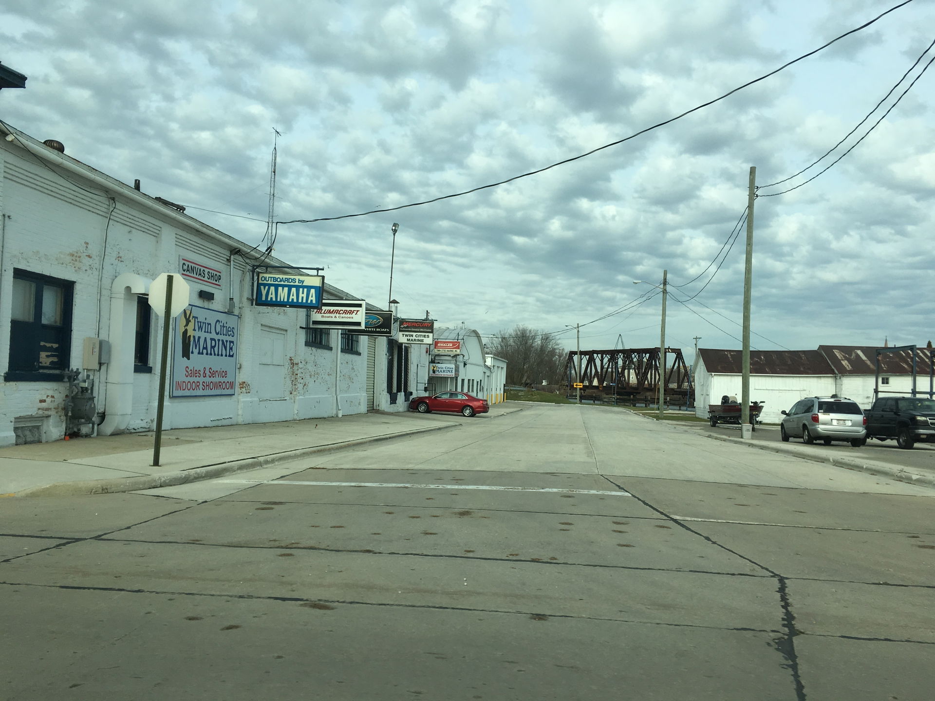 Various signage outside the entry to the Two Cities Marine show…