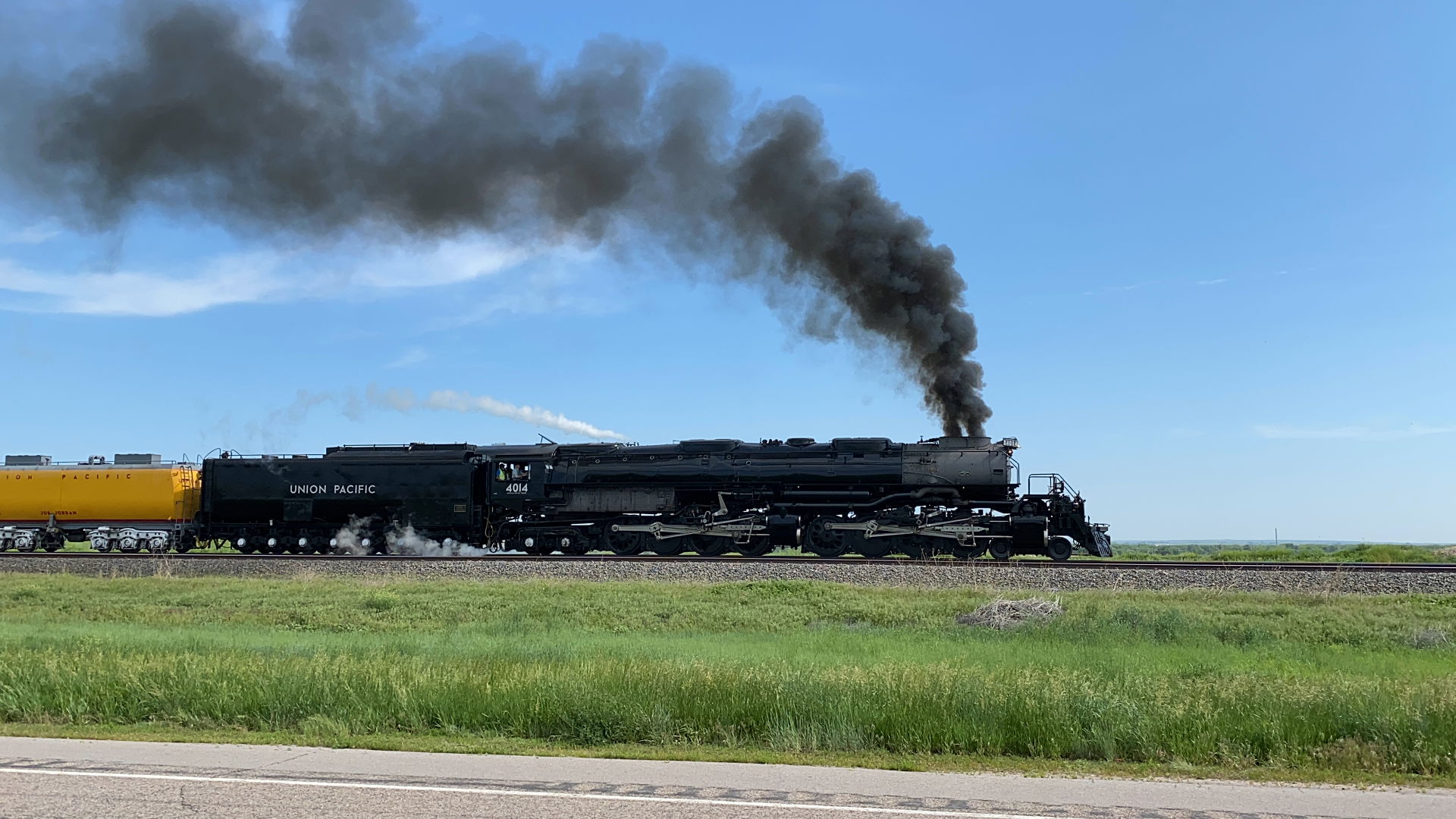 Union Pacific Big Boy No. 4014 accelerates east out of Gering, …