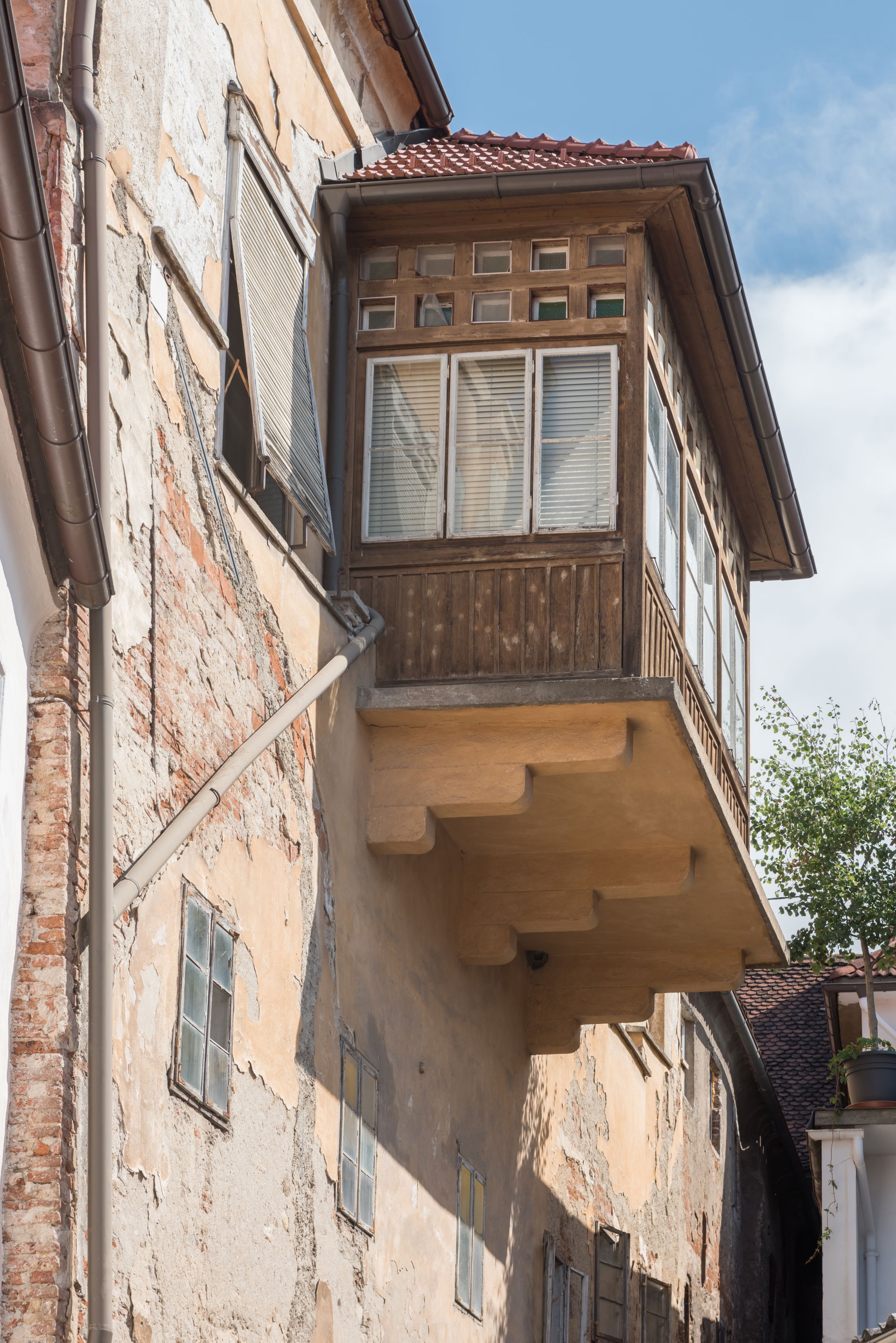 Decaying house with veranda on Bindergasse, municipality Wolfsb…