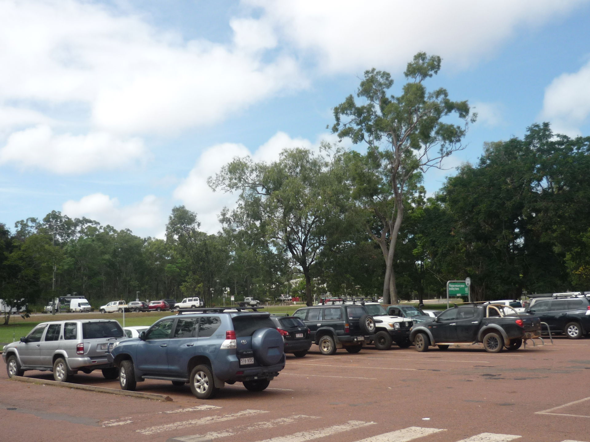 Woolworths shopping centre car park of four-wheel drives, Weipa…