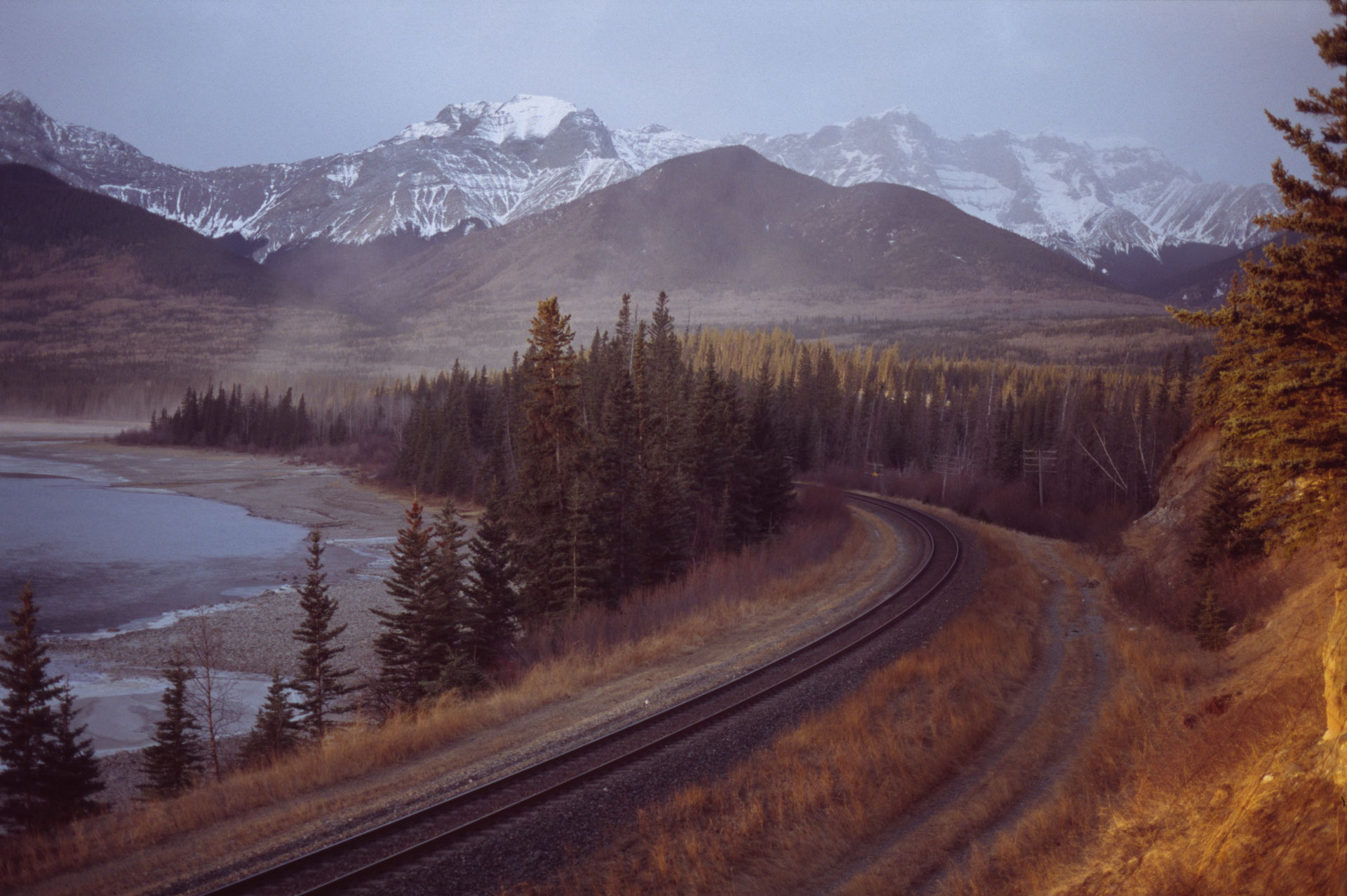 The Athabasca River railroad track at the mouth of Brûlé Lake i…