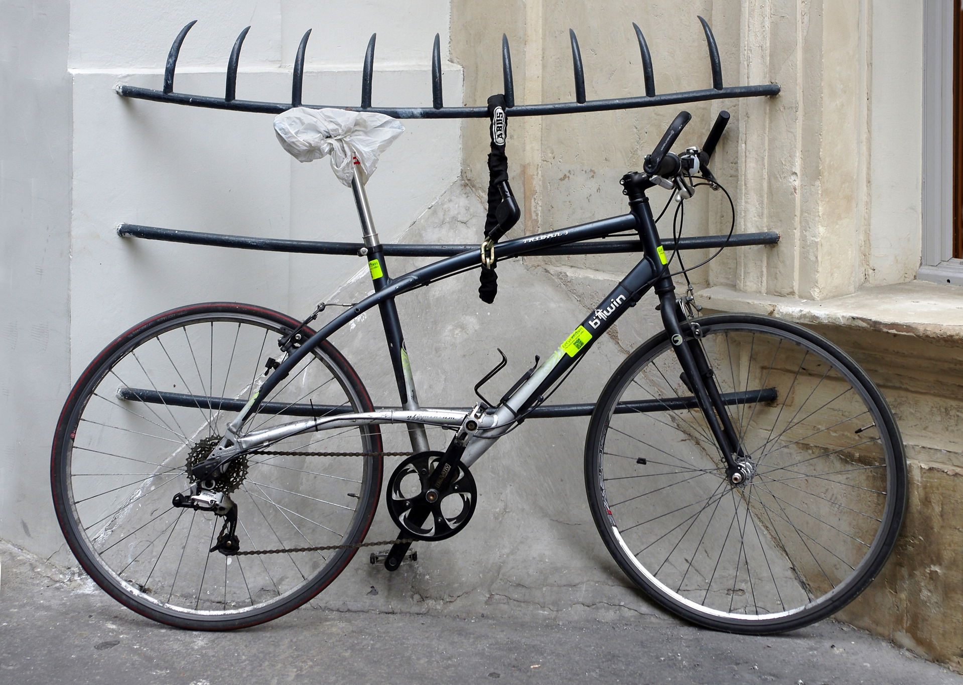 Bicycle (B'Twin Triban), with a lock, Paris (VIIIth arrondissem…