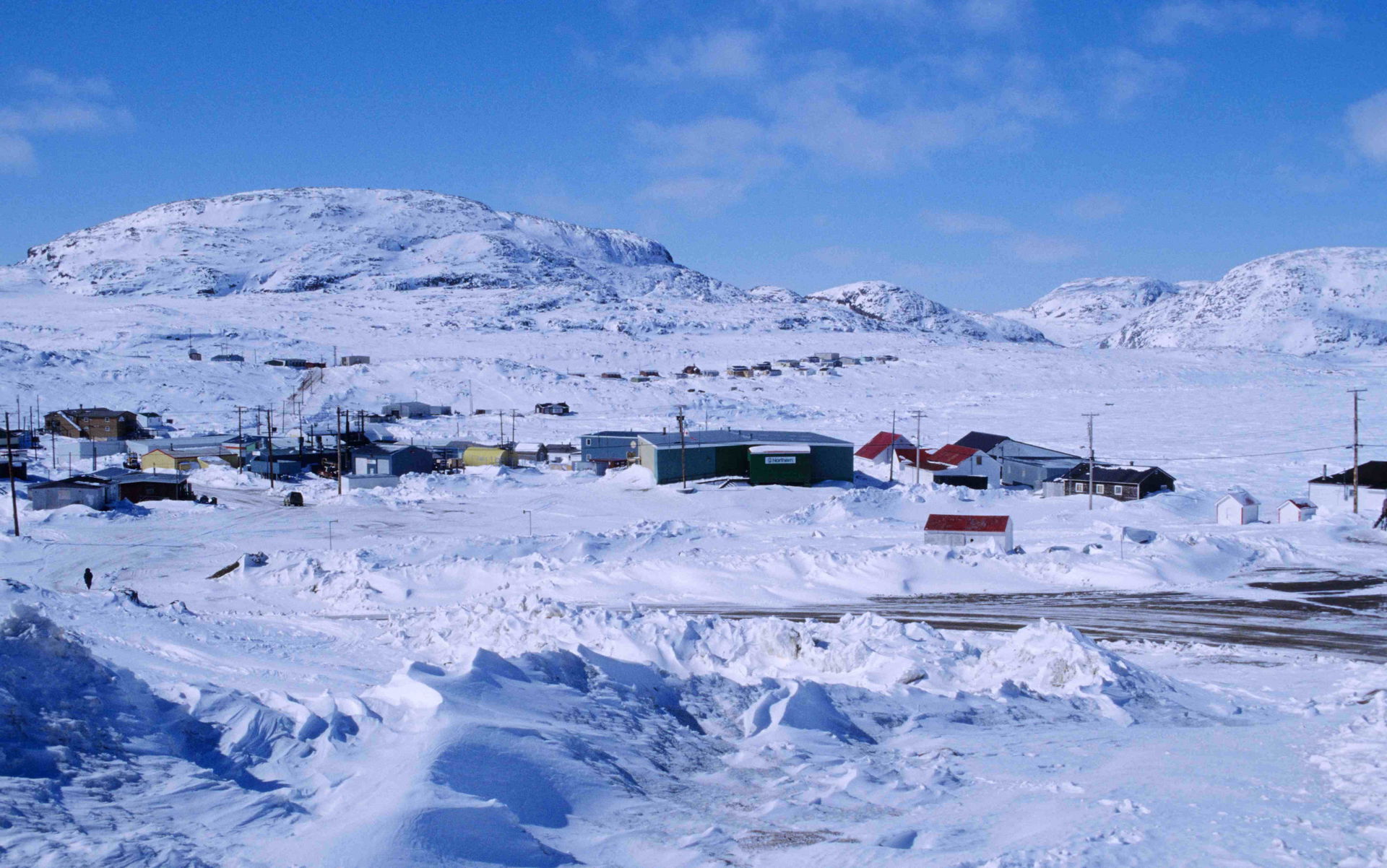 Early springtime in Cape Dorset (background: Kinngait)