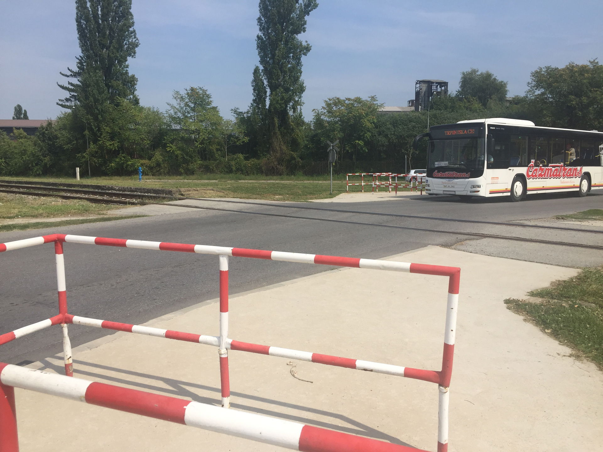Bus of Čazmatrans Vukovar at a railway crossing in Borovo nasel…