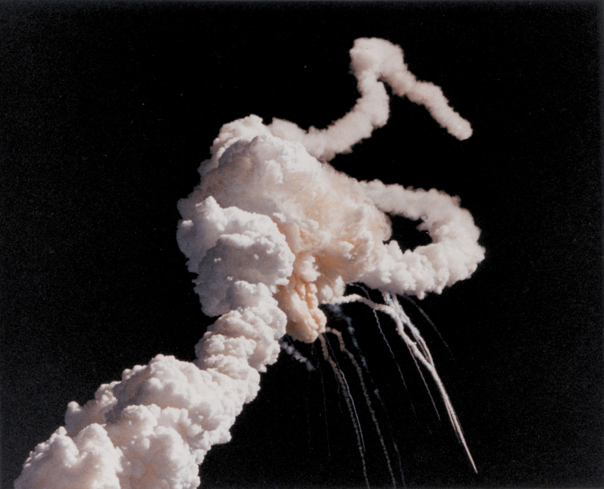 Short Description: Space Shuttle Challenger explodes shortly af…