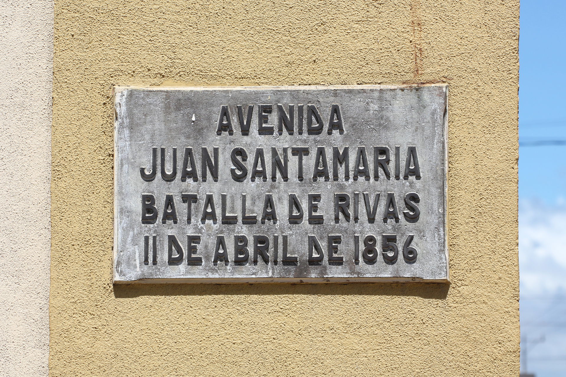 Street sign (Avenida Juan Santamaria) in San Ramón, Costa Rica