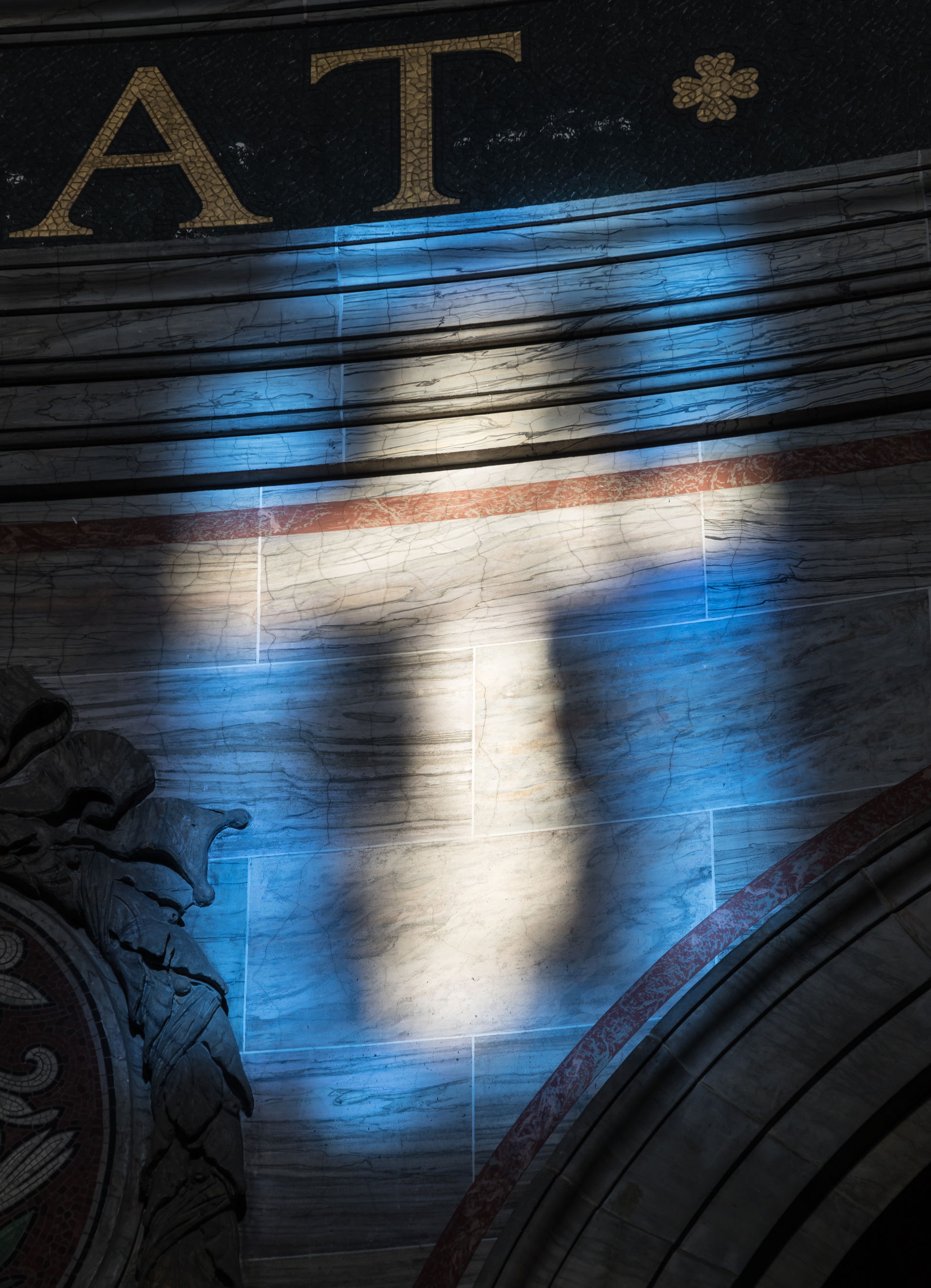 Reflection of a stained glass window on a wall, Frederiks Kirke…