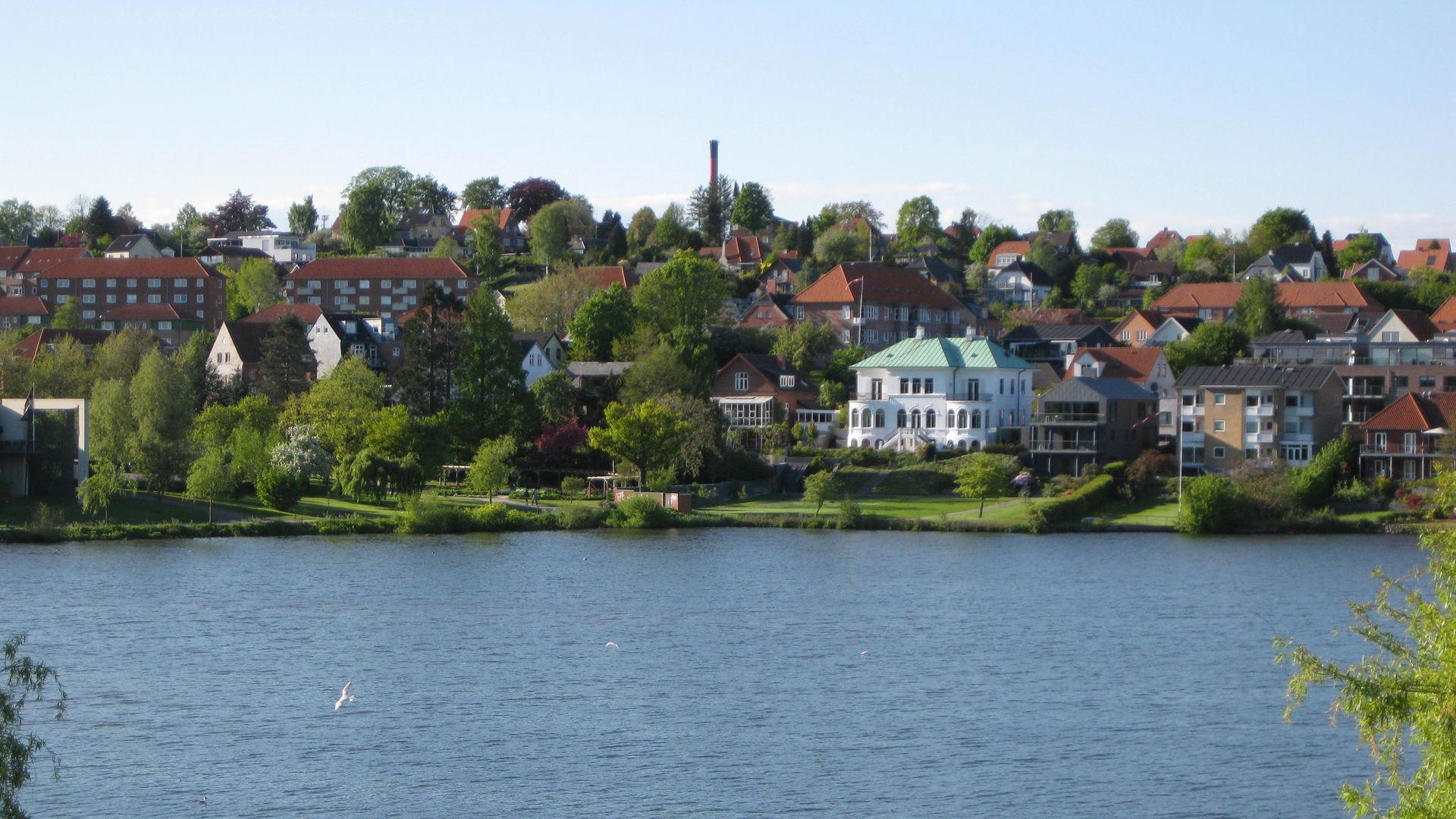 The castle lake "Kolding Slotsø" in the city of "Kolding". The …