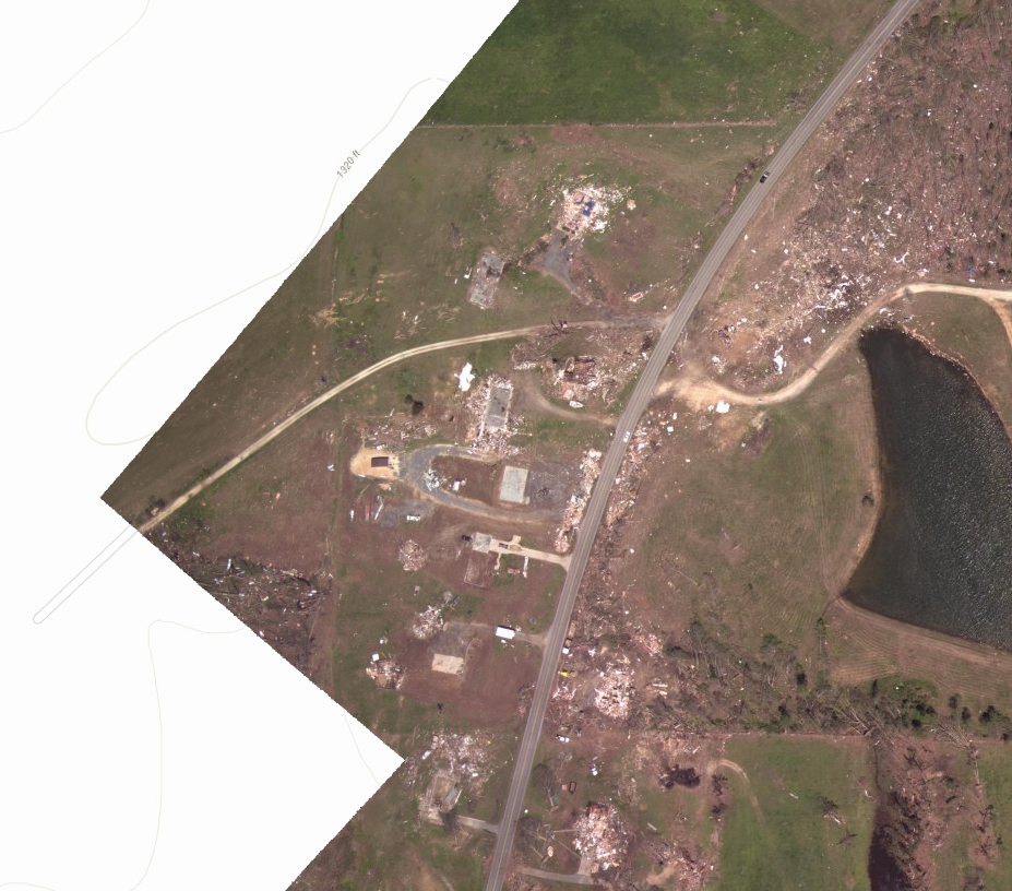 Aerial imagery of destroyed homes near Blue Pond Blvd E, north …