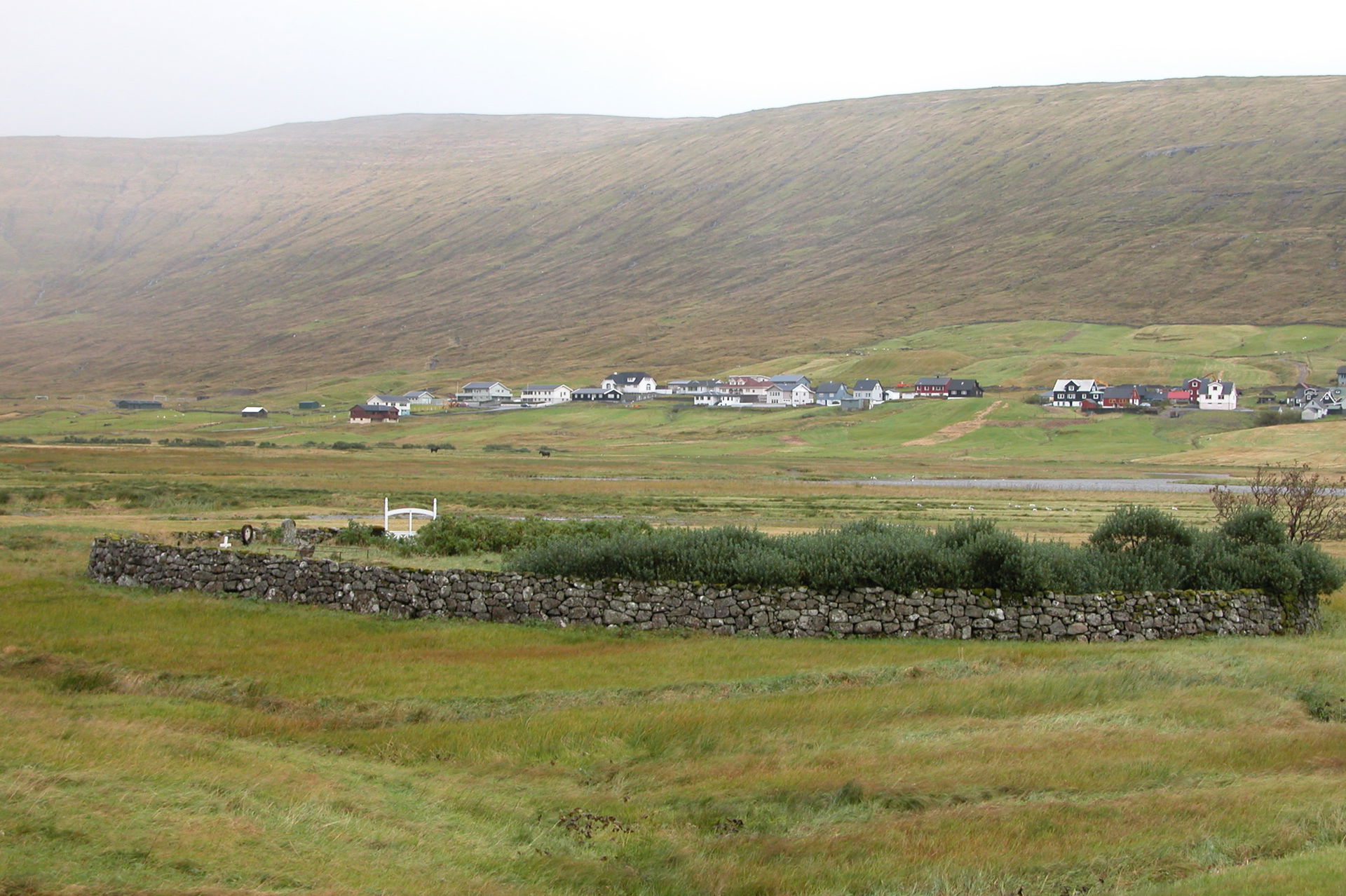 Churchyard of Hvalvík on Streymoy, Faroe Islands. In the backgr…