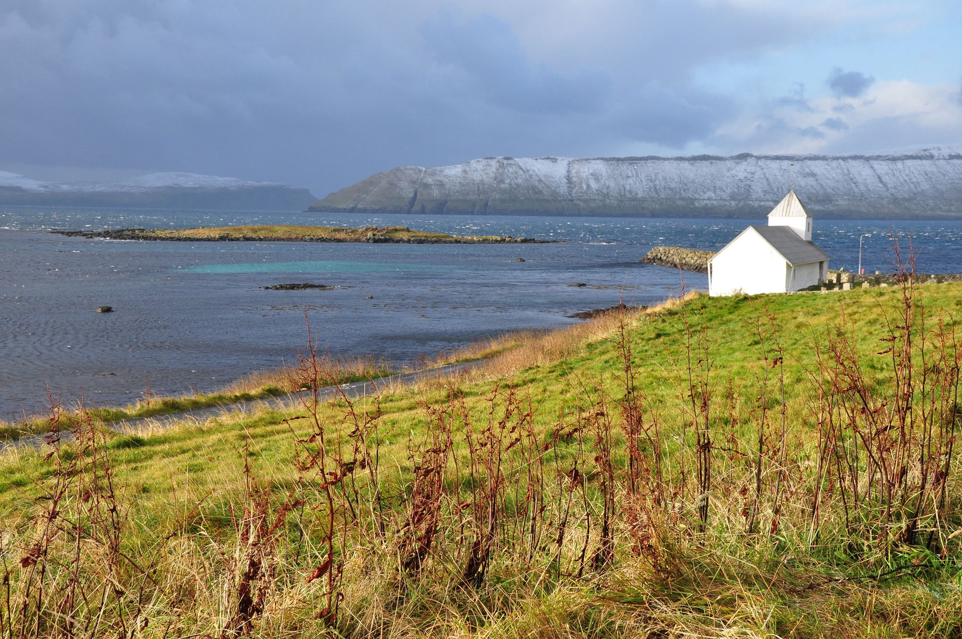 12th century Saint Olav's Church on the shore of Hestsfjørður i…