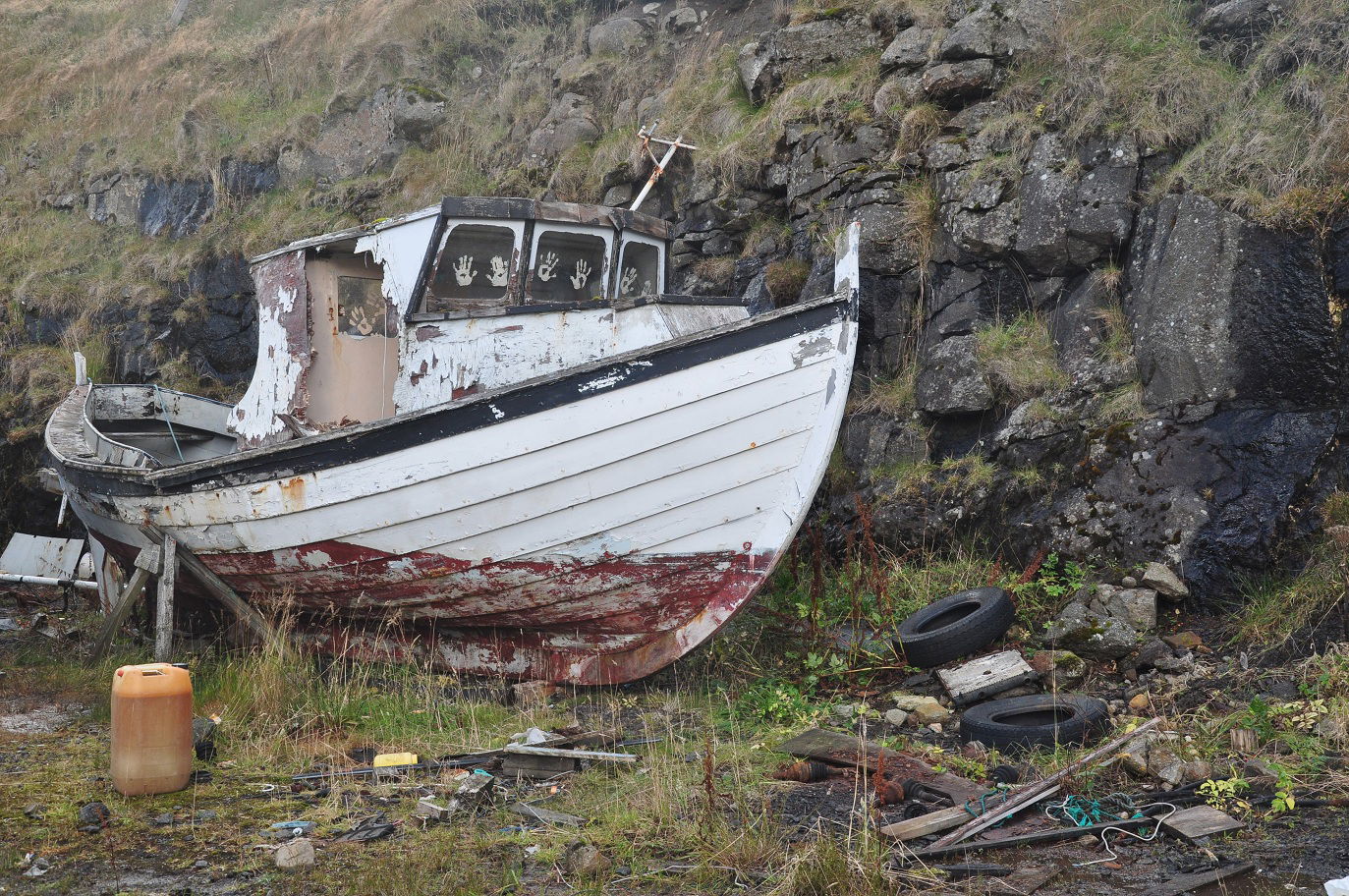Abandoned boat in the harbour of Ljósá, Eysturoy, Faroe Islands.