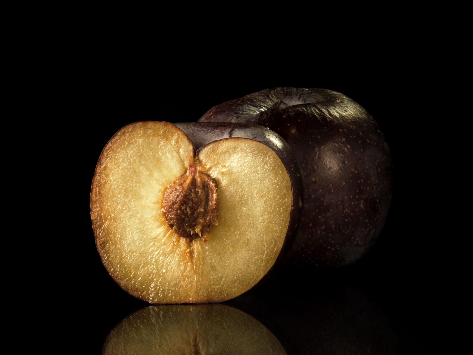 Plum in a black background