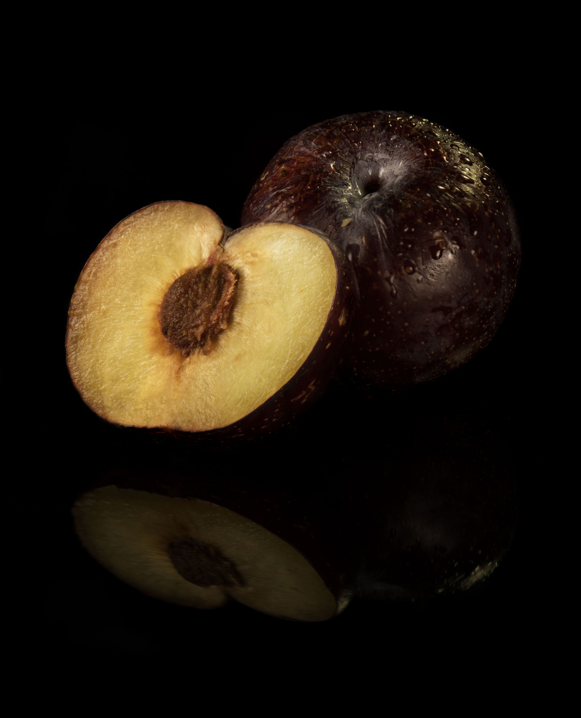 Plum in a black background