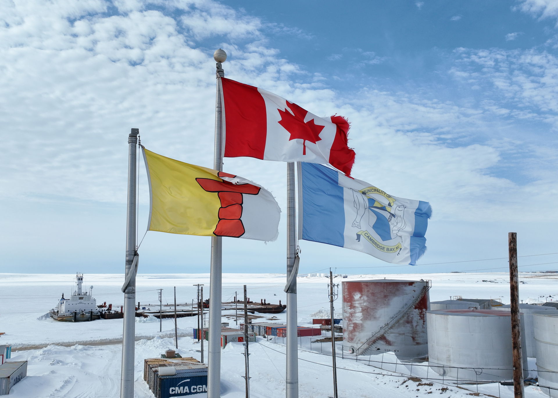 Flags waving in Cambridge Bay, Nunavut (top-Canada, left-Nunavu…