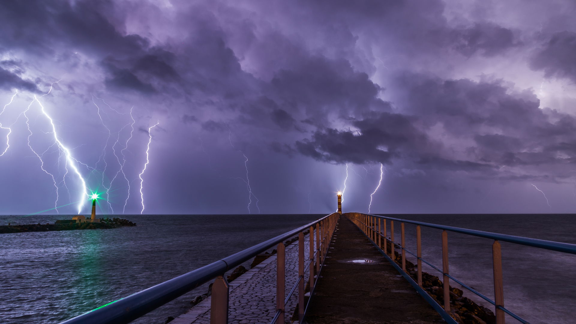 Port and lighthouse overnight storm with lightning in Port-la-N…