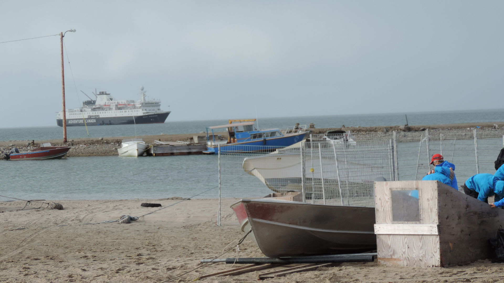 Gjoa Haven shoreline with Ocean Endeavour moored off-shore, Sep…