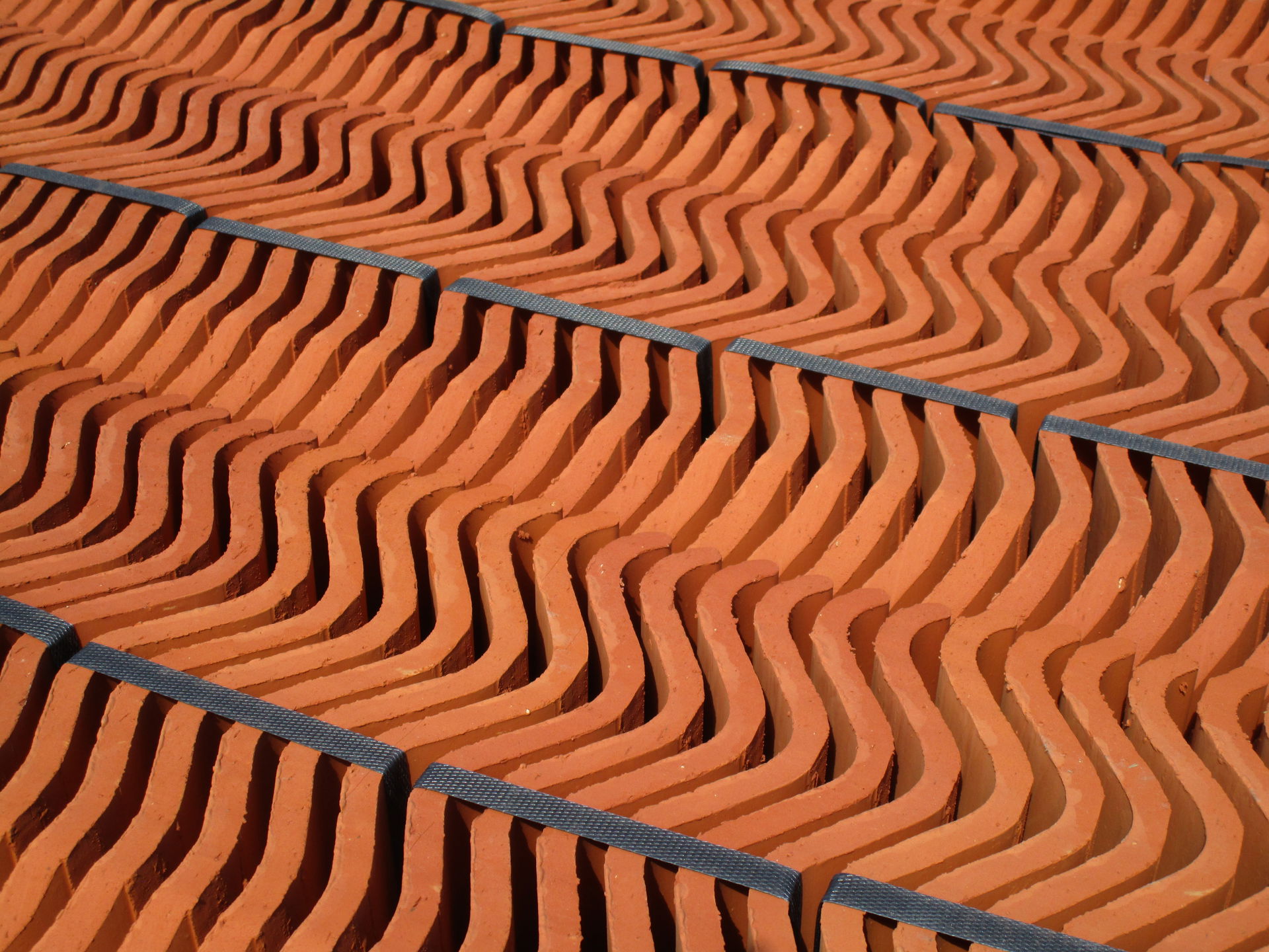 Red Vittinge Tegel clay roof tiles at a construction site by Sm…