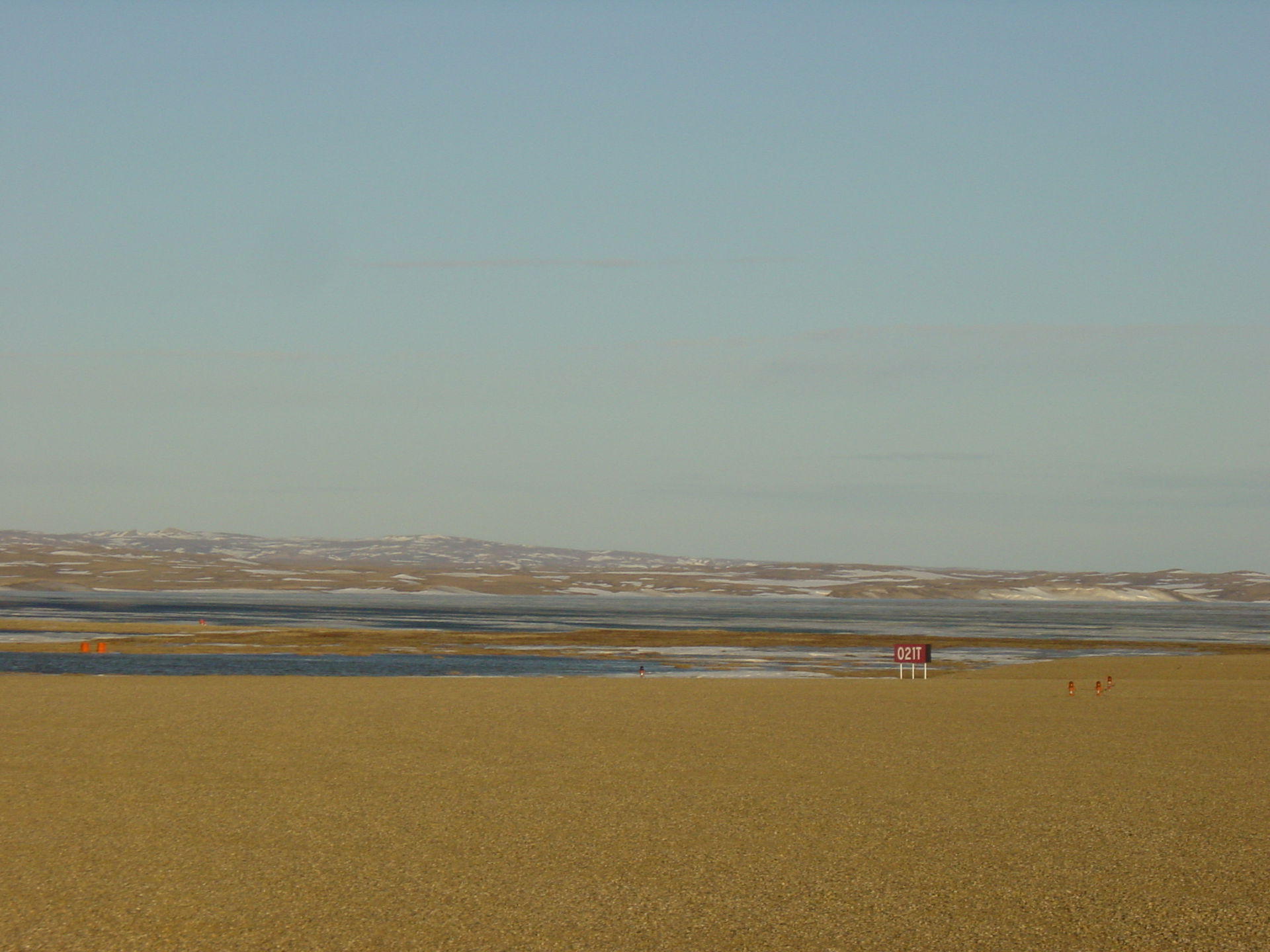 View down the Paulatuk airport runway.