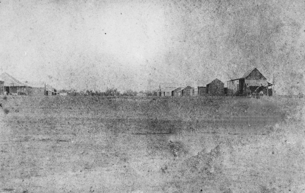 Burketown, ca. 1870
View of houses and town buildings in an ear…